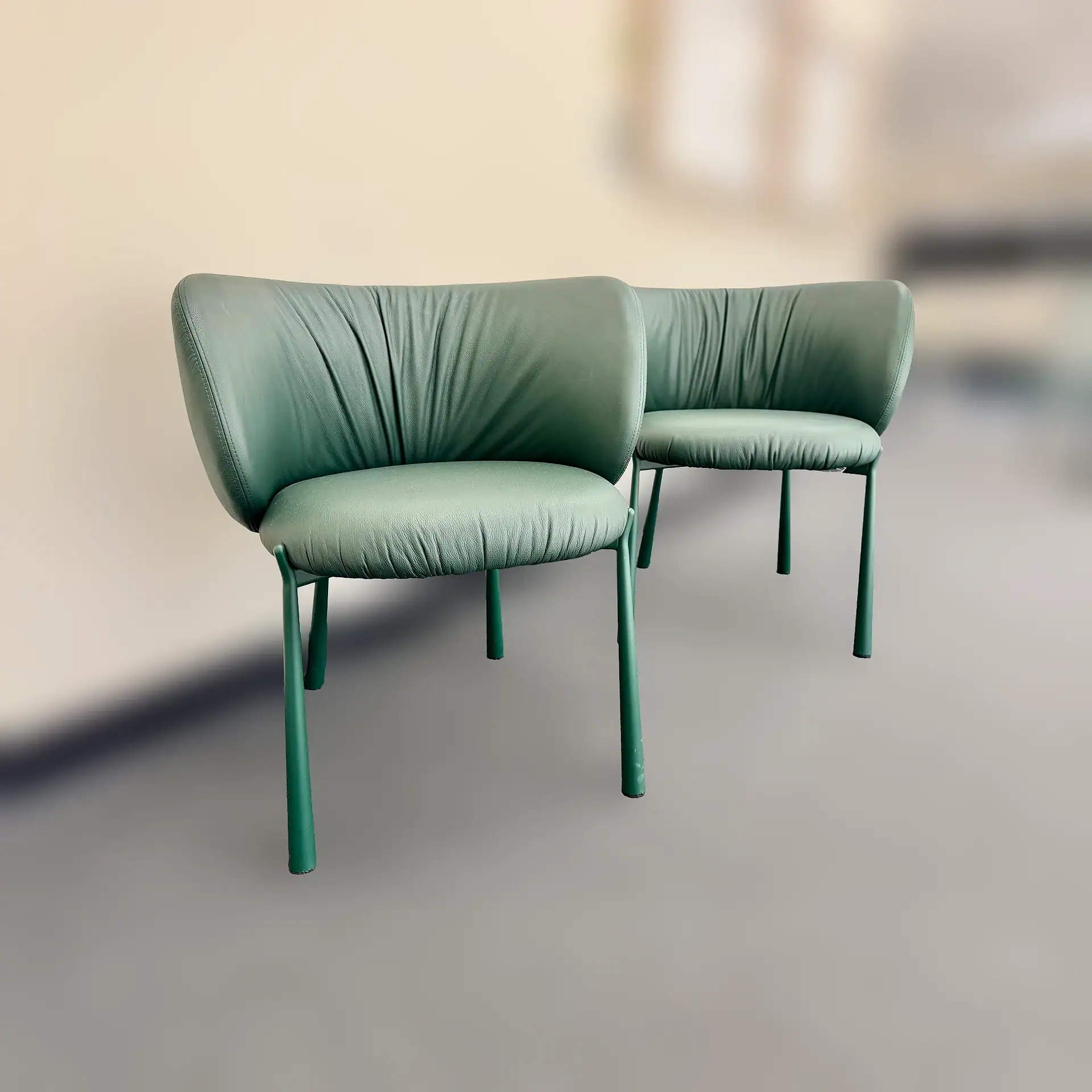 Elegant green dining chairs with modern design for stylish interiors.