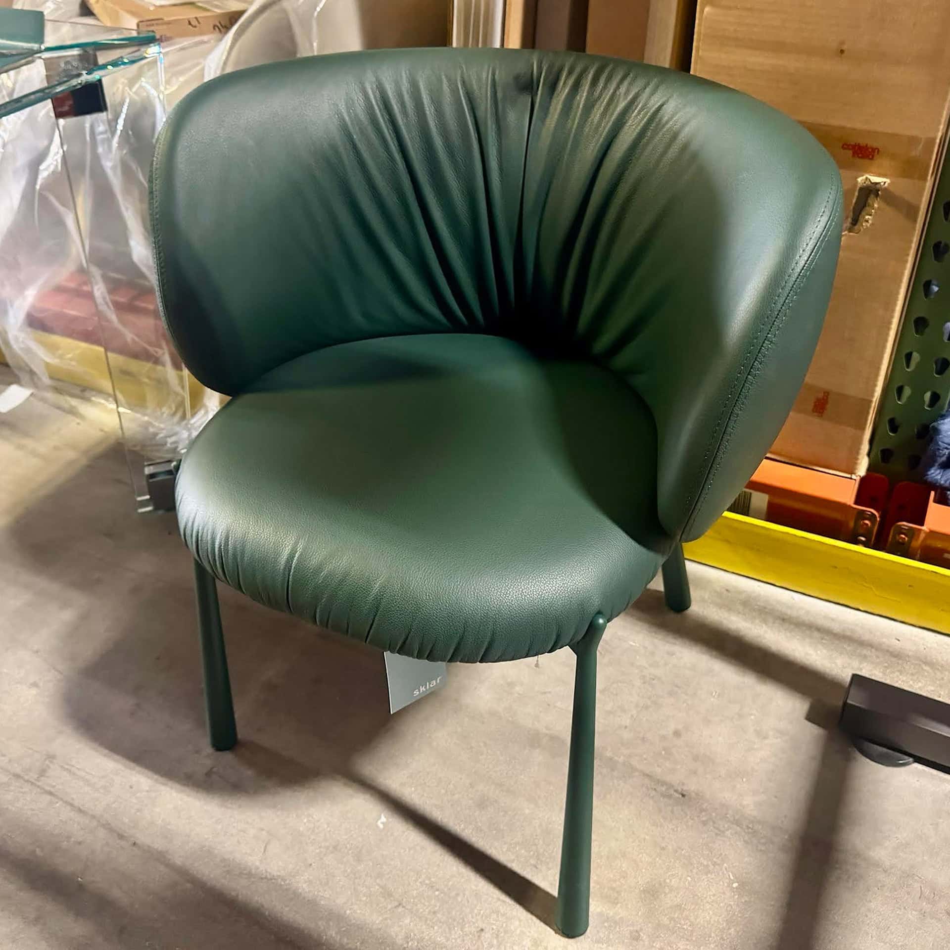 Elegant green Midj Mys dining chair with plush upholstery.