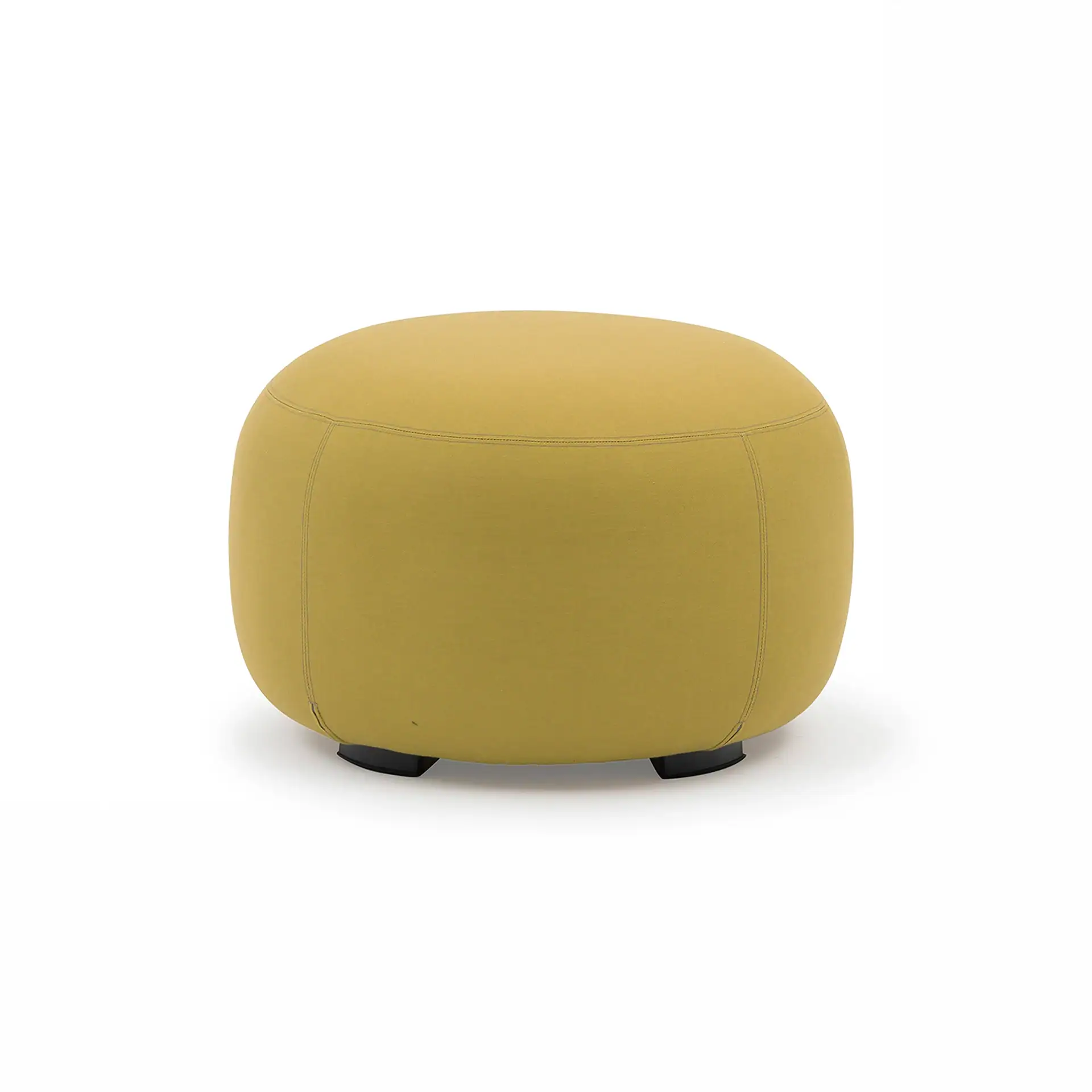 A mustard yellow, oval-shaped fabric ottoman with visible stitching and small black feet, against a white background.