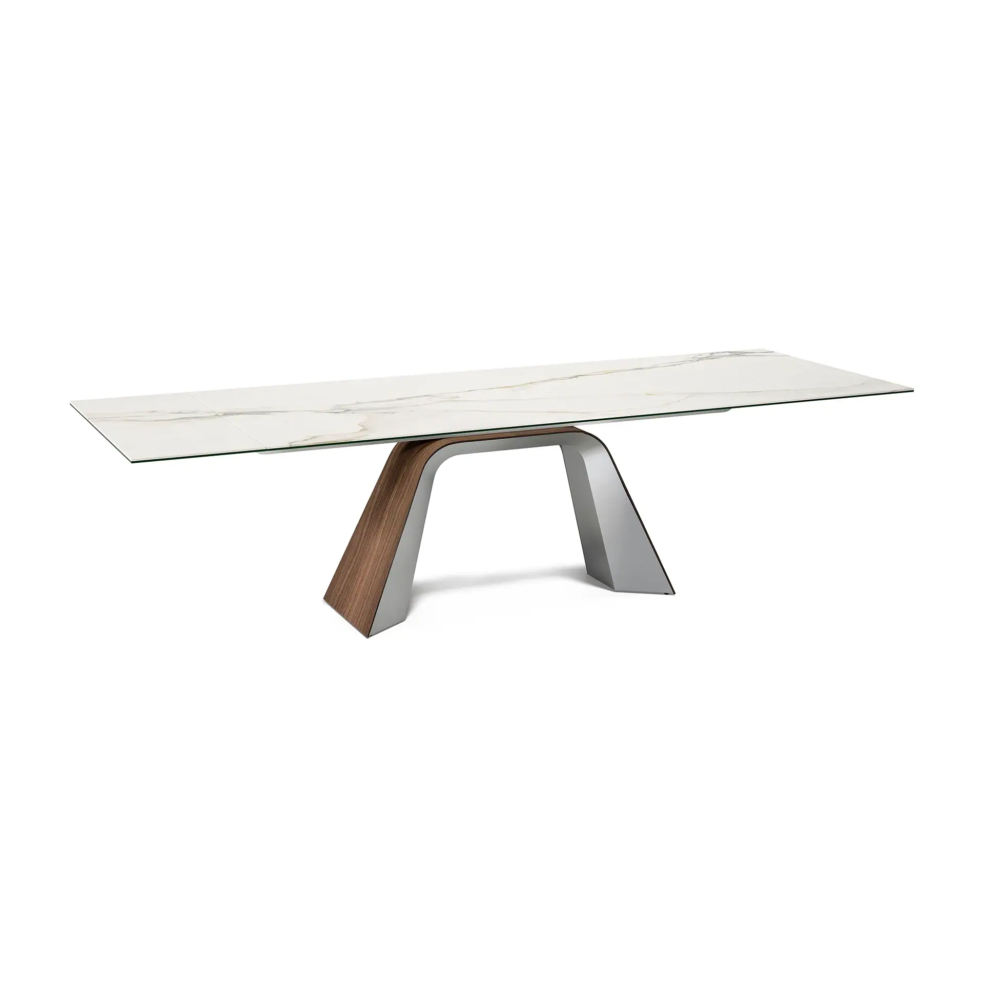 A modern rectangular dining table with a white marble-patterned top, clear glass layer, and an arched base made of dark wood and silver metal.