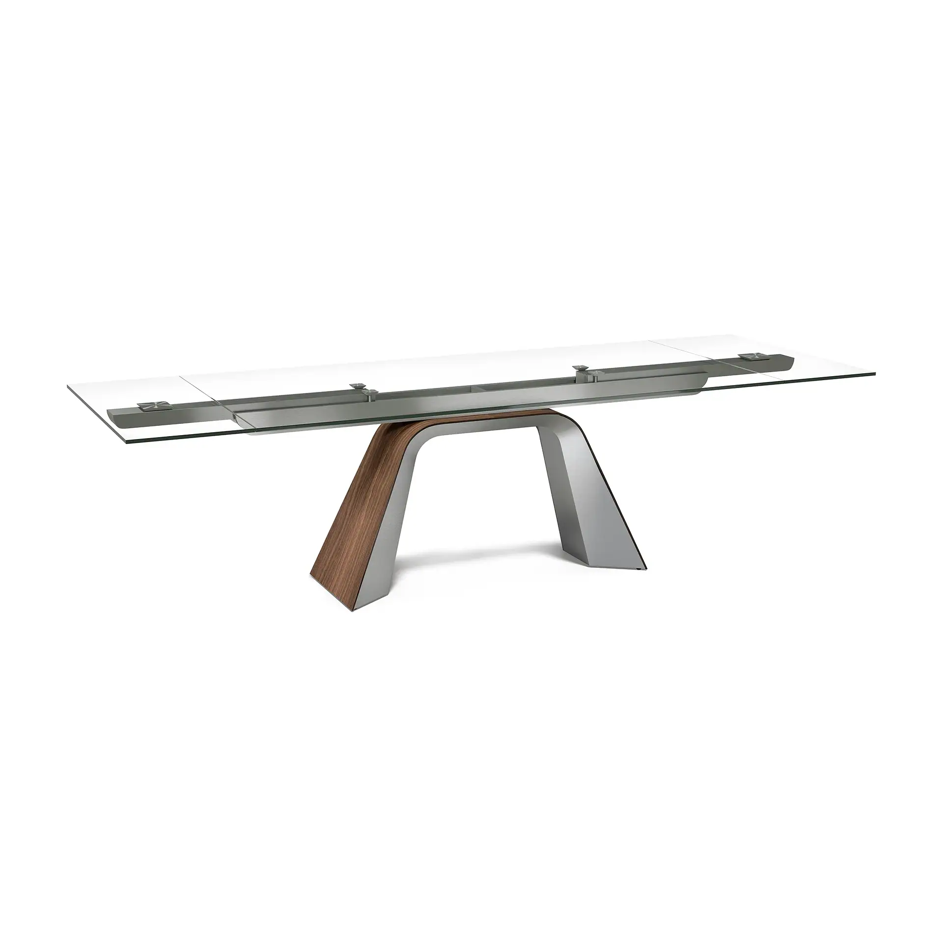 Modern extendable dining table with a clear glass top and an arched base made of dark wood and brushed silver metal.