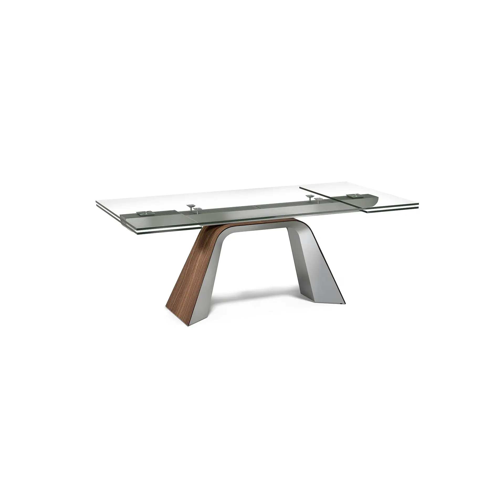 Modern dining table with a clear glass top and a unique arched base made of wood and silver-colored metal.