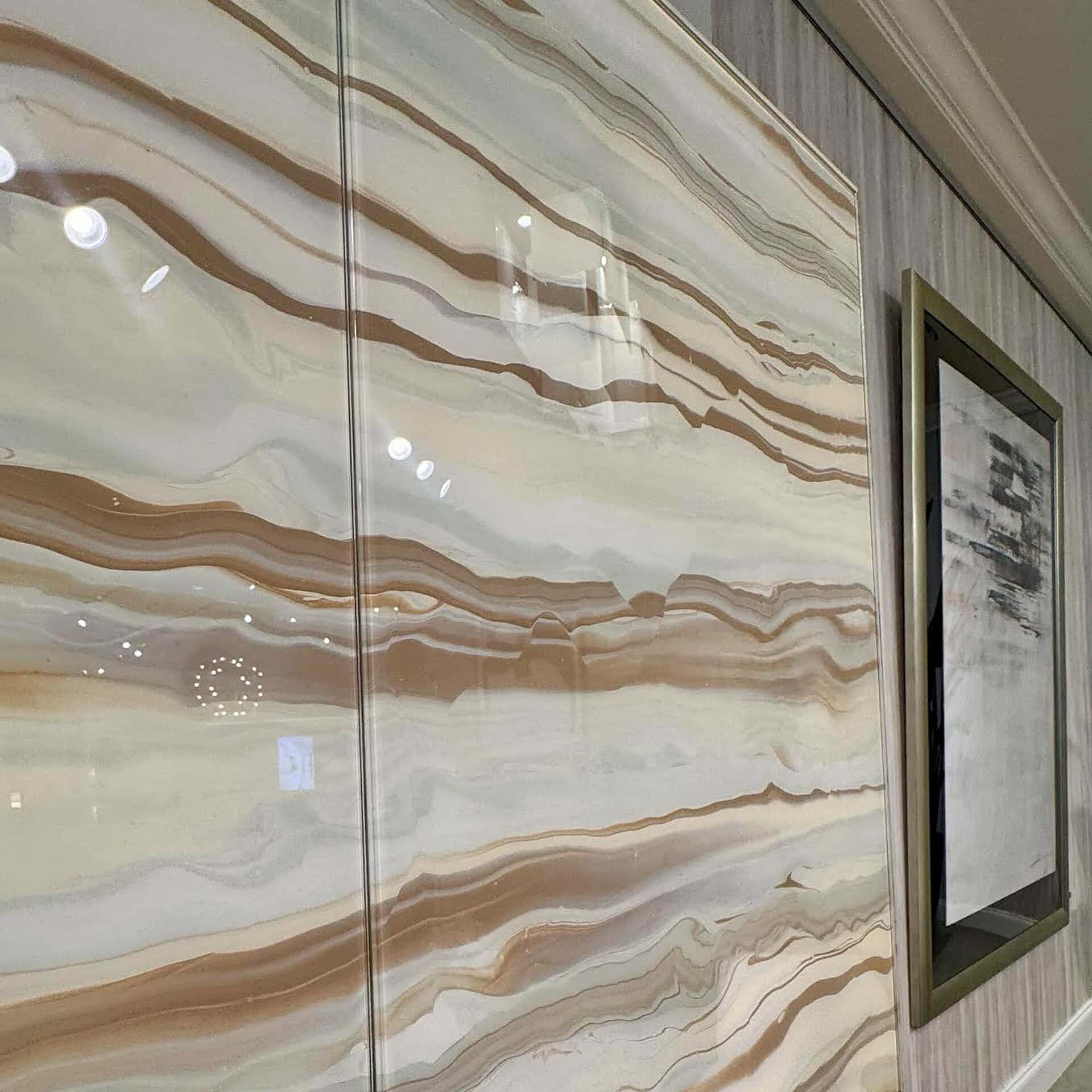 Elegant glass bar cabinet with a sleek design and modern finish.