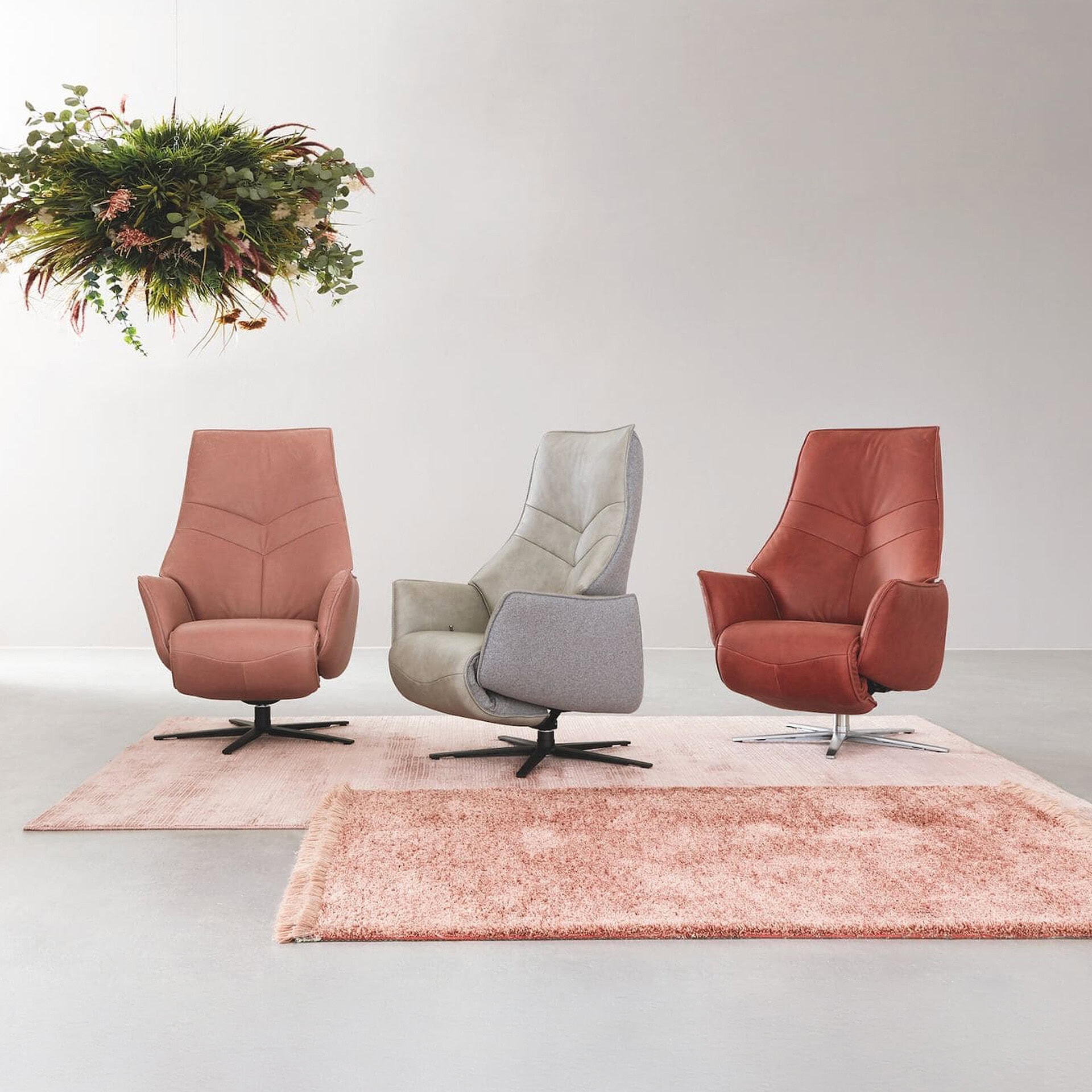 Recliner chair with modern design in beige, pink, and red, perfect for stylish living rooms.