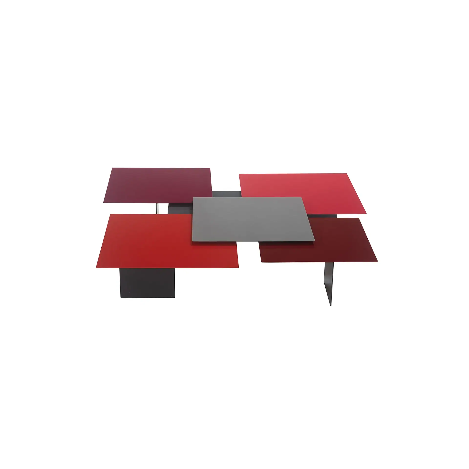 Modern coffee table with overlapping rectangular surfaces in red, burgundy, and gray, on a white background.