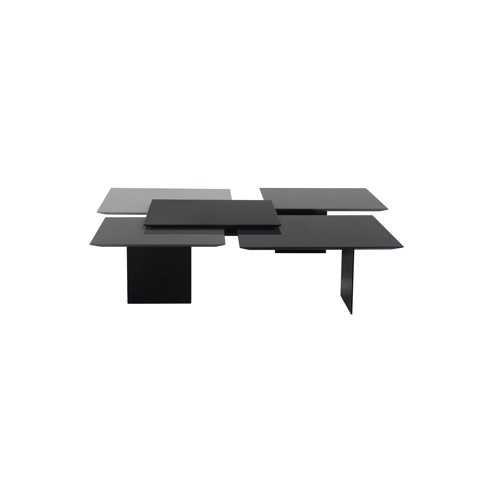Modern coffee table with overlapping rectangular surfaces in light gray, dark gray, and black, supported by two distinct black bases.