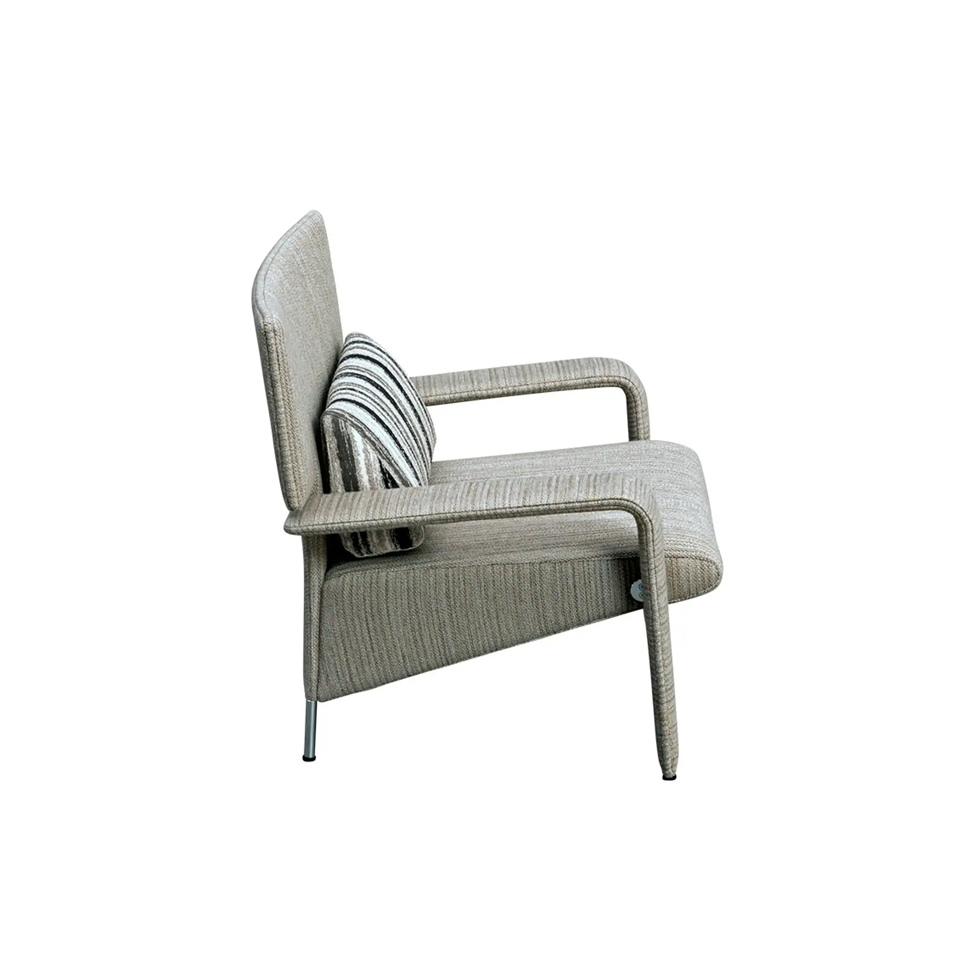 Side view of a modern upholstered armchair in light beige with a striped throw pillow, on a white background.