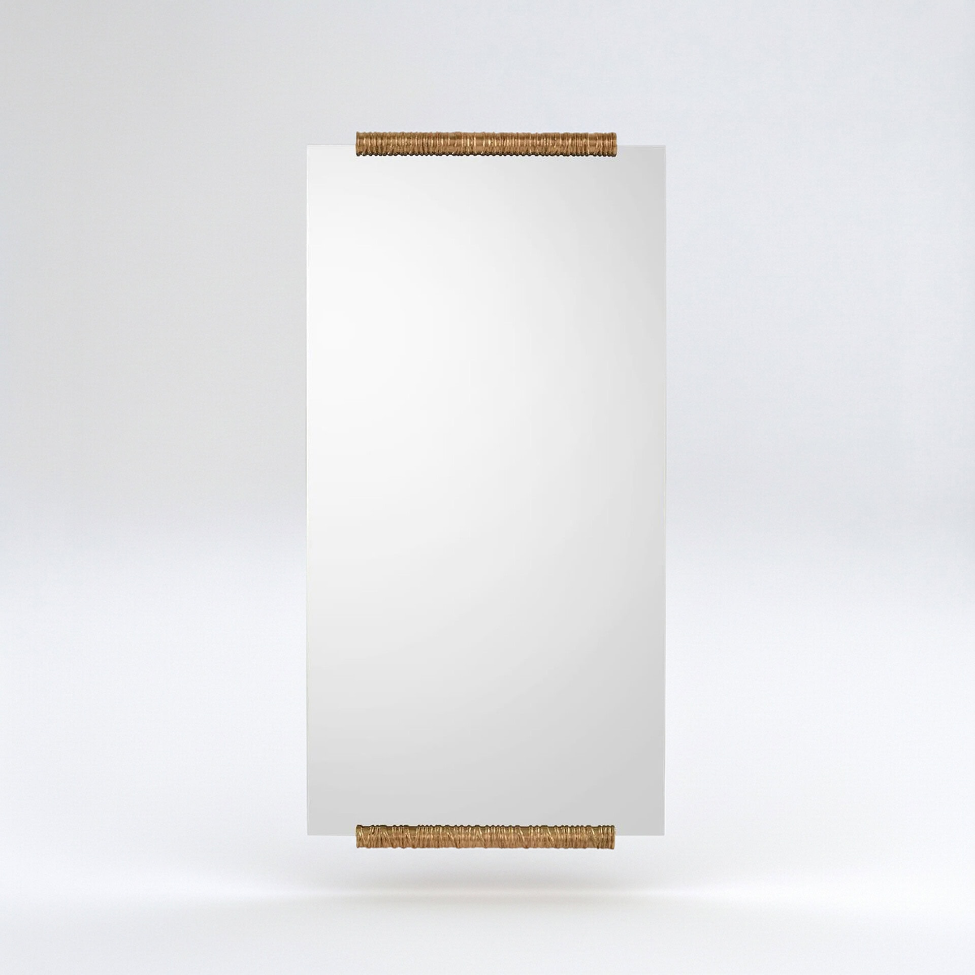 Elegant Annulus wall mirror with woven frame, ideal for modern interior design.