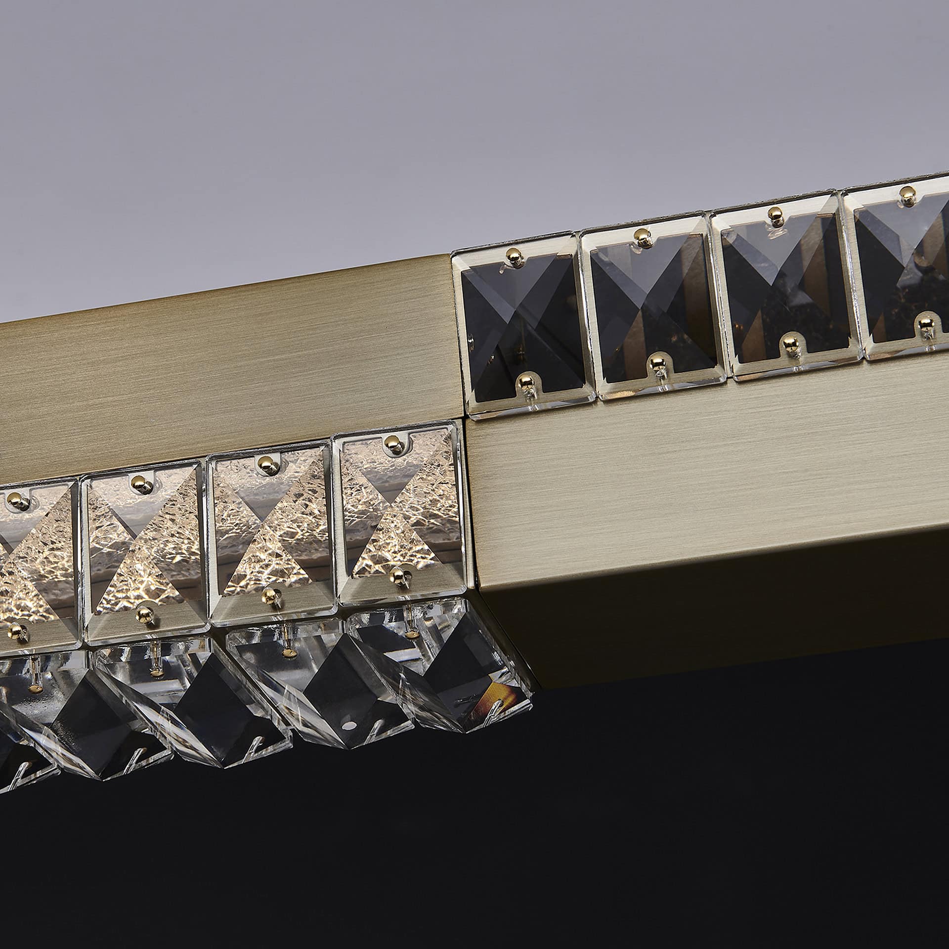 Elegant Dama 60-inch crystal island pendant lighting fixture. Perfect for modern kitchens and dining.