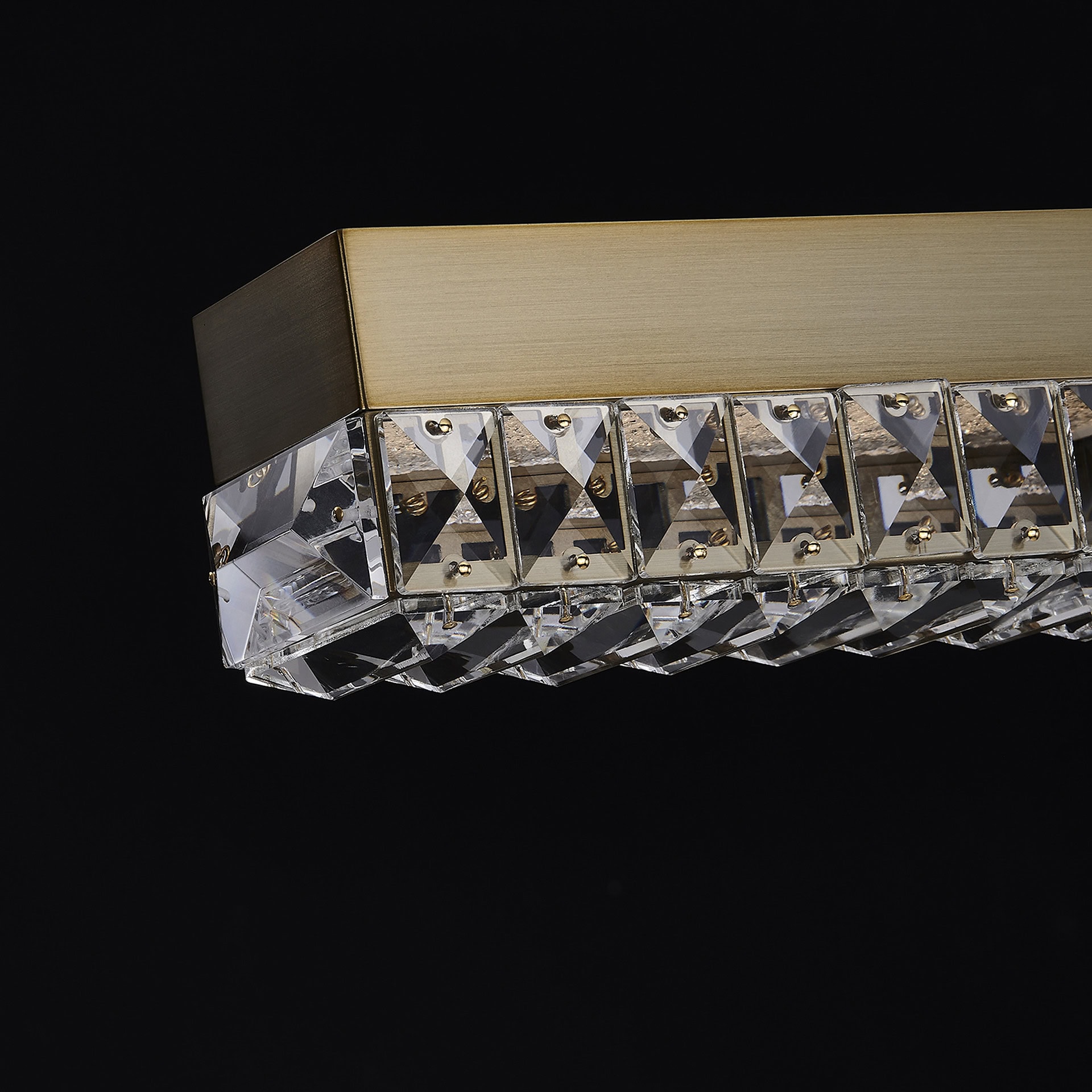 Elegant Dama 60-inch crystal island pendant lighting fixture. Perfect for modern kitchens and dining.