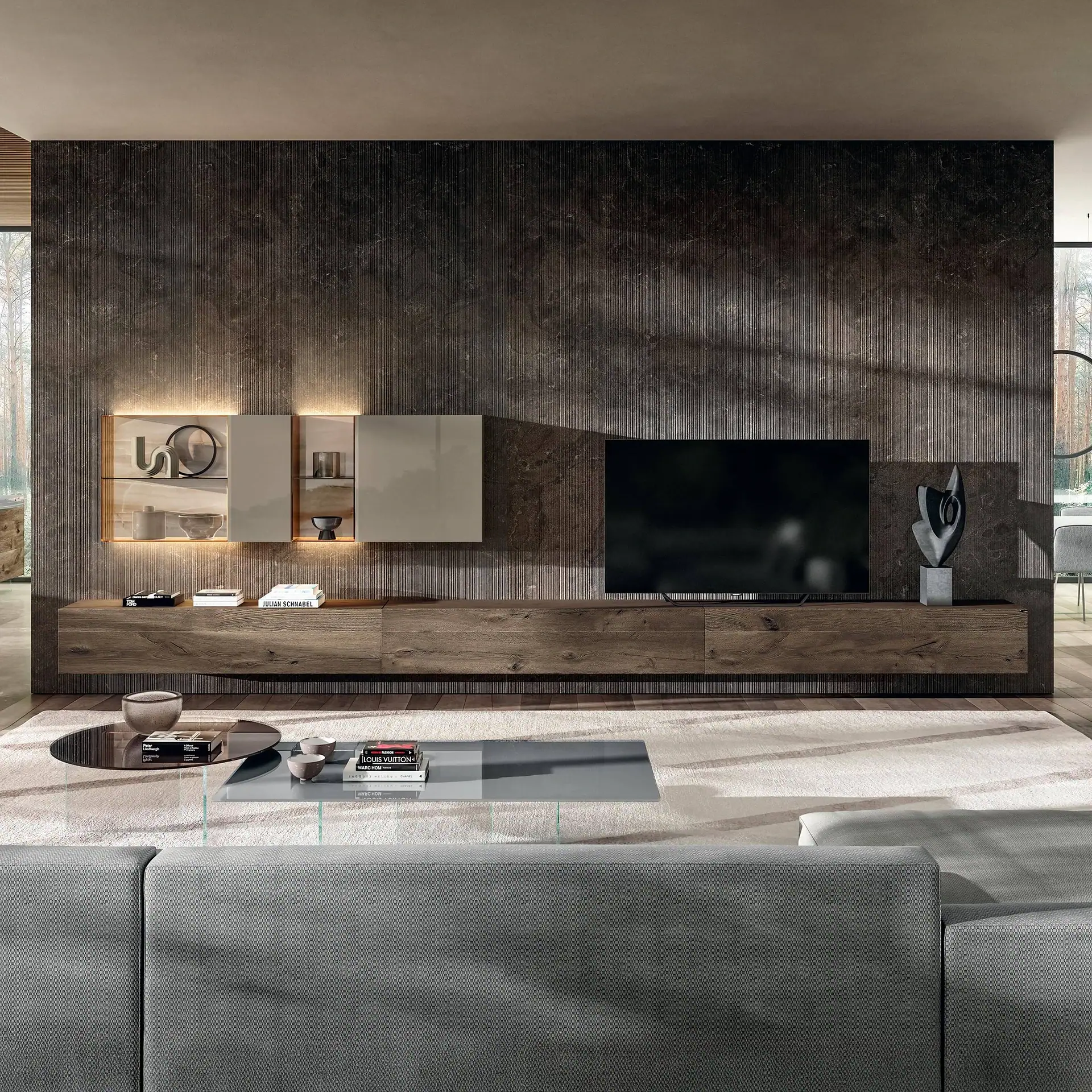 Sklar Furnishings modular wall unit with TV and decorative items in modern living room.