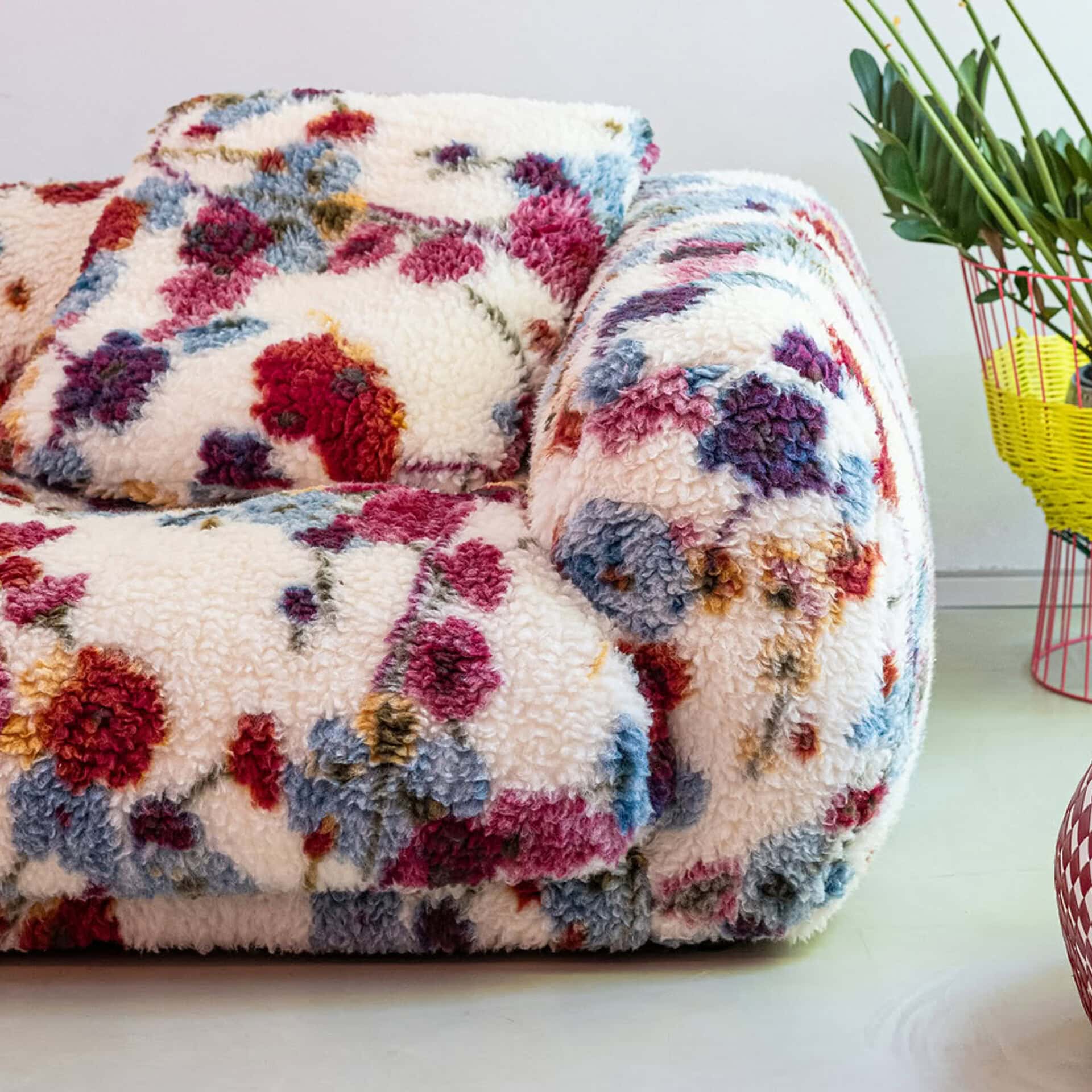 Soft floral plush sofa for modern living rooms.