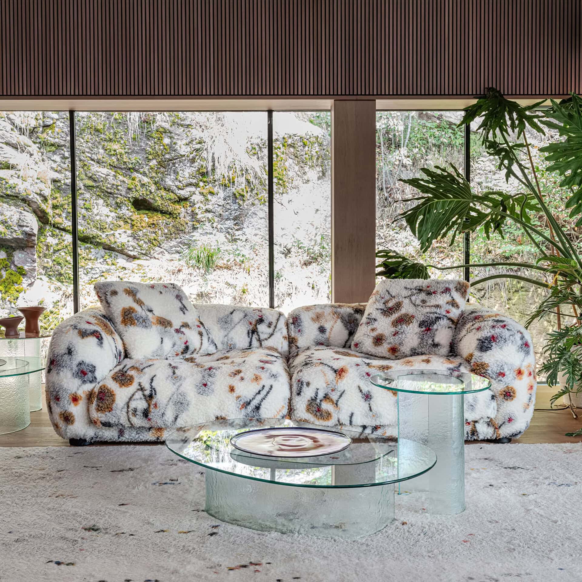 Modular sectional sofa with plush, patterned fabric, perfect for relaxing in a modern living space.