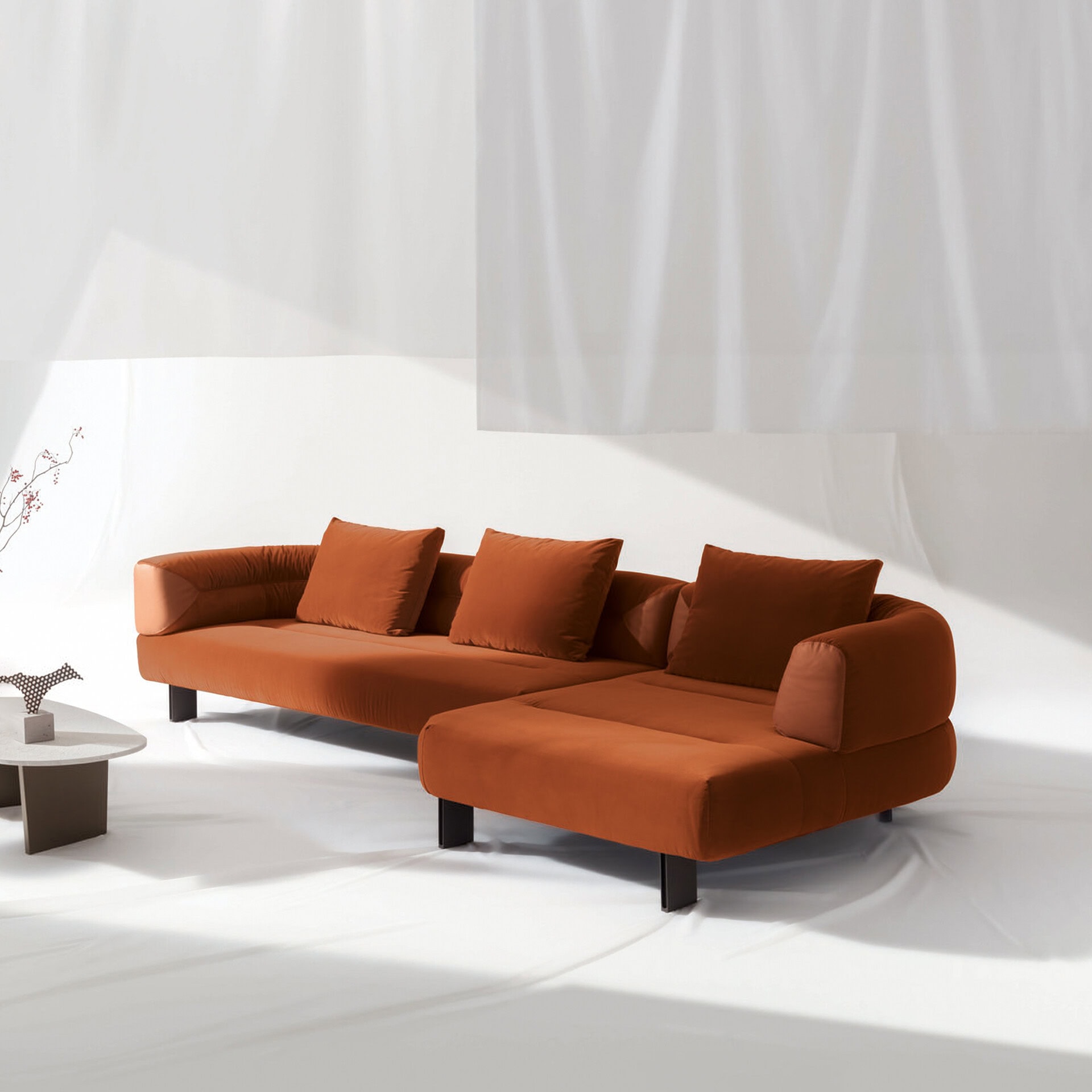 Modern Klarence sectional sofa with plush cushions in a stylish burnt orange color.