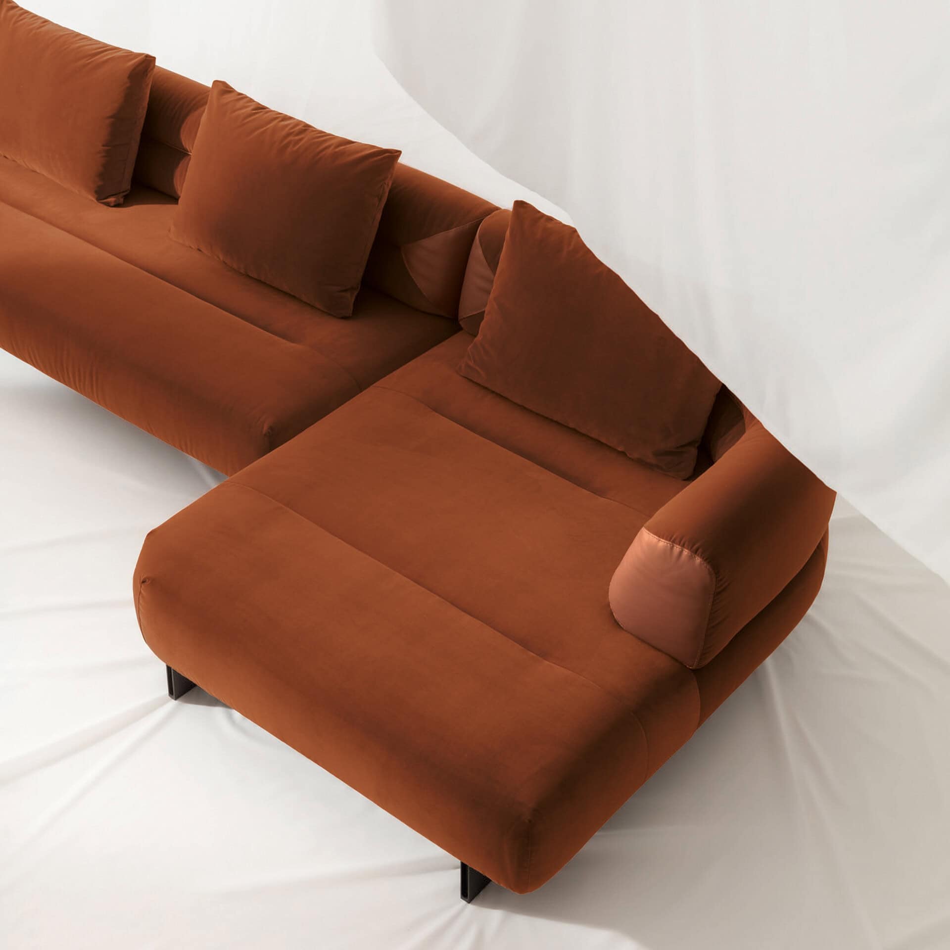 Modern Klarence sectional sofa in warm brown fabric for stylish living rooms.