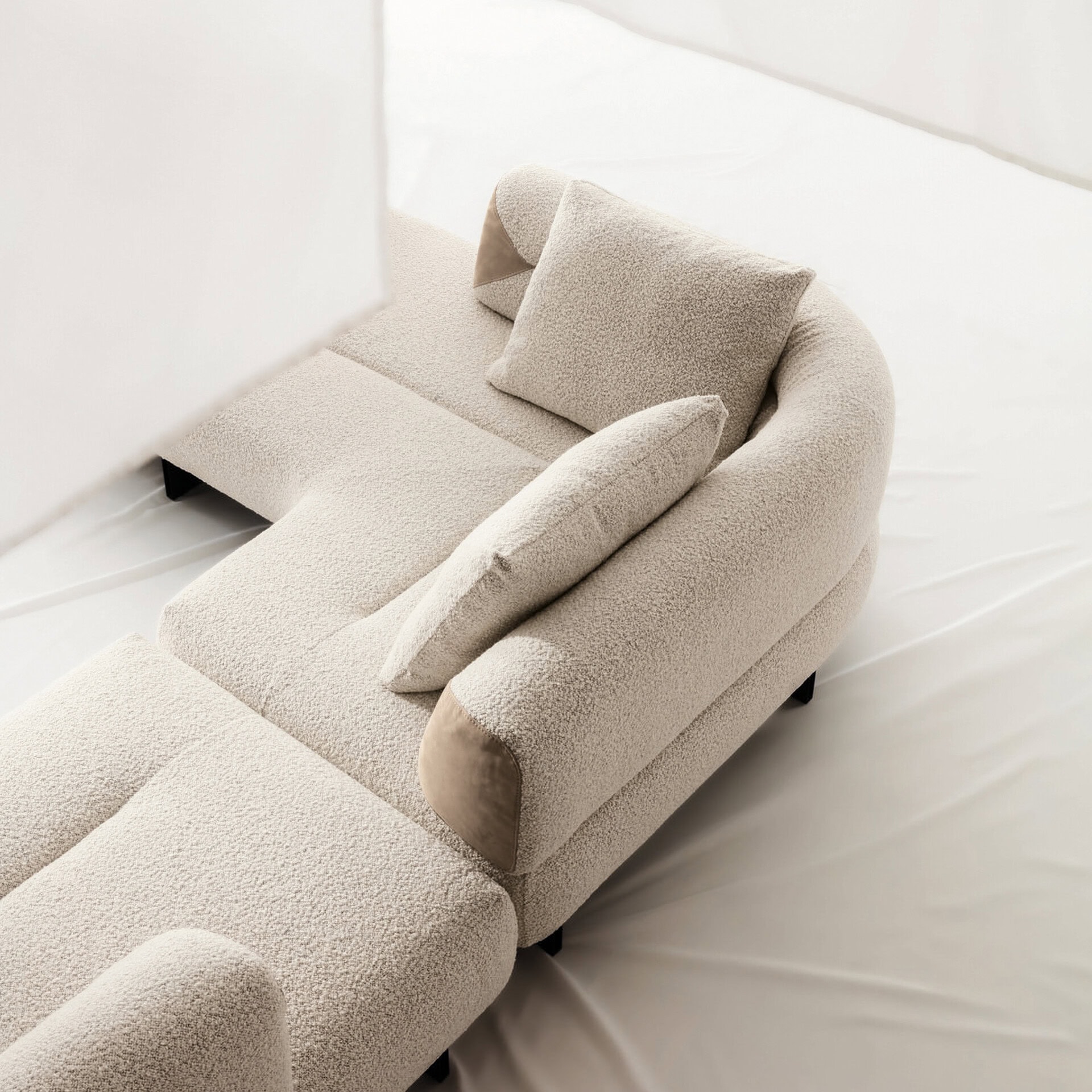 Modern Klarence sectional sofa with plush fabric and customizable configuration.