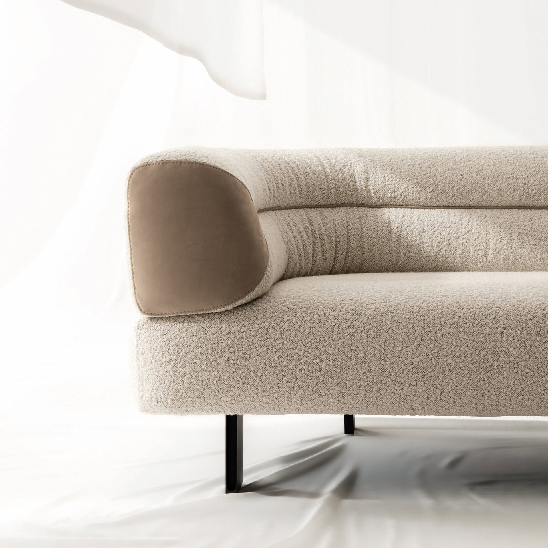 Modern Klarence sectional sofa with plush cushions and neutral fabric.