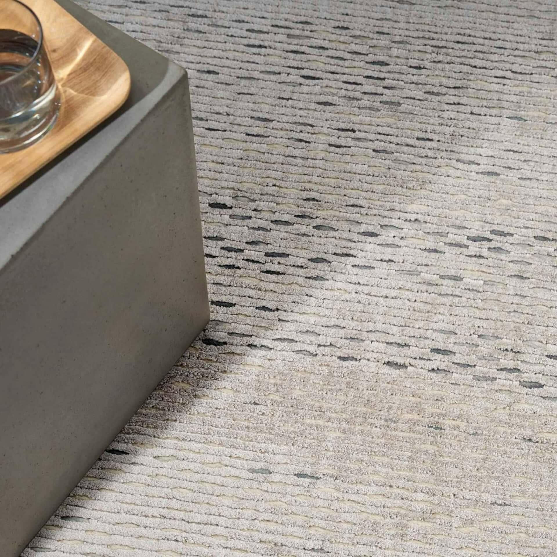 Calvin Klein Valley VLL01 area rug with modern striped design in neutral tones.