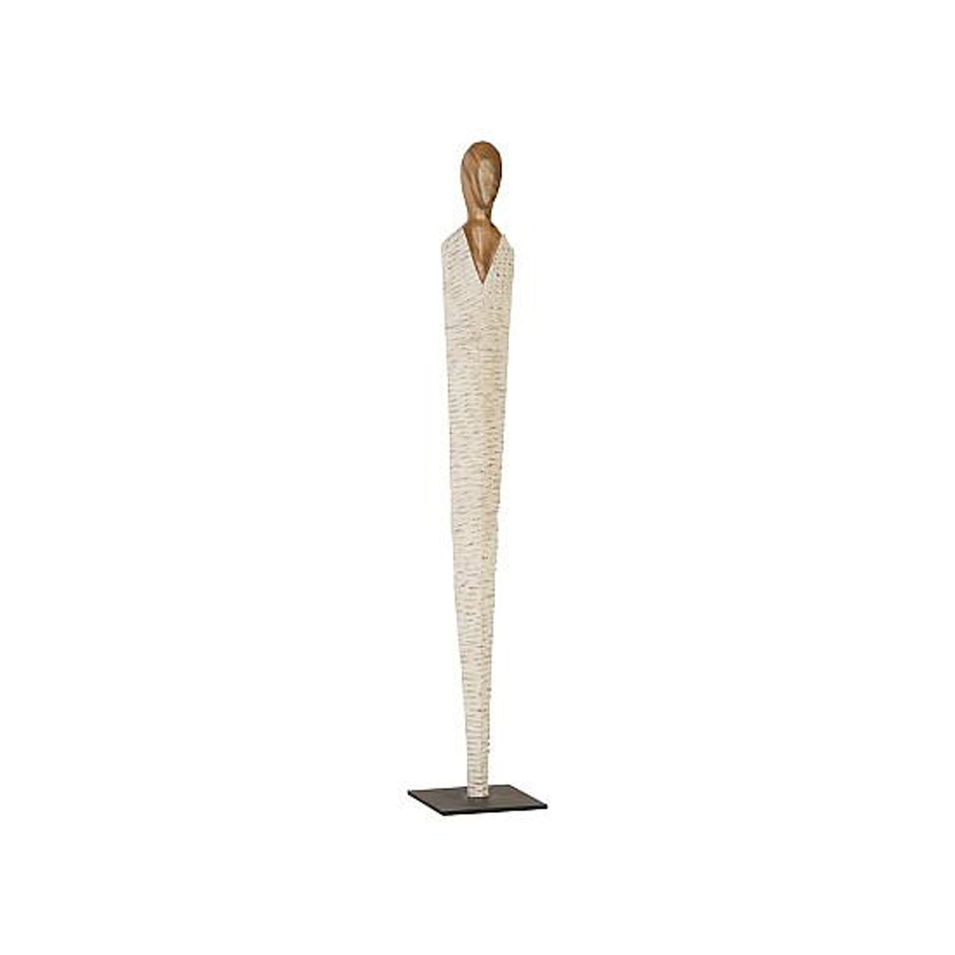 Vested wood sculpture with elongated form and textured surface.