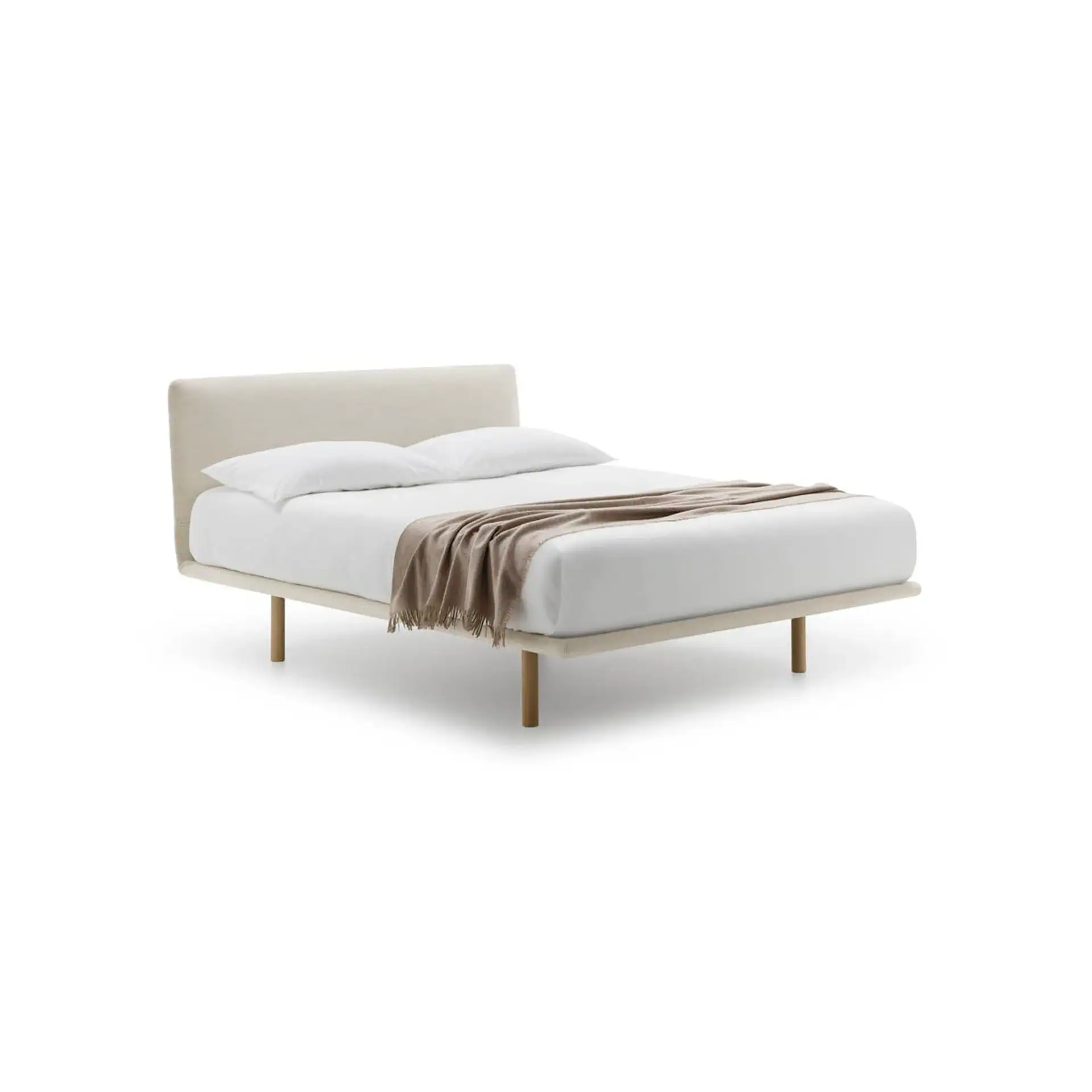 A modern bed with a light beige upholstered frame and headboard, white bedding, and a brown throw blanket, on a white background.