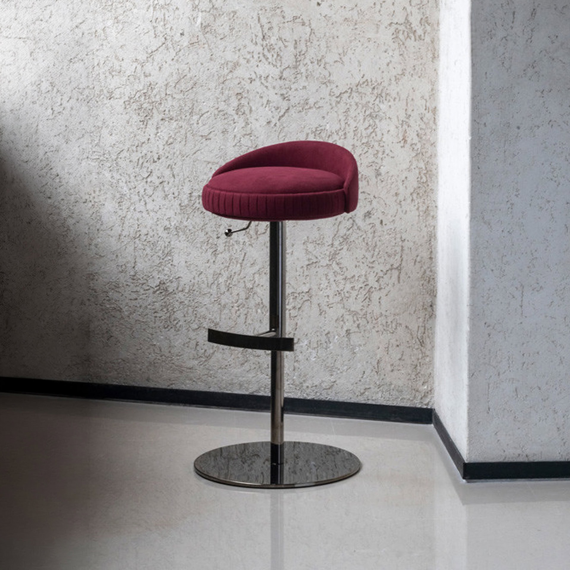 Adjustable plissé upholstered stool with modern design, perfect for stylish seating in contemporary.