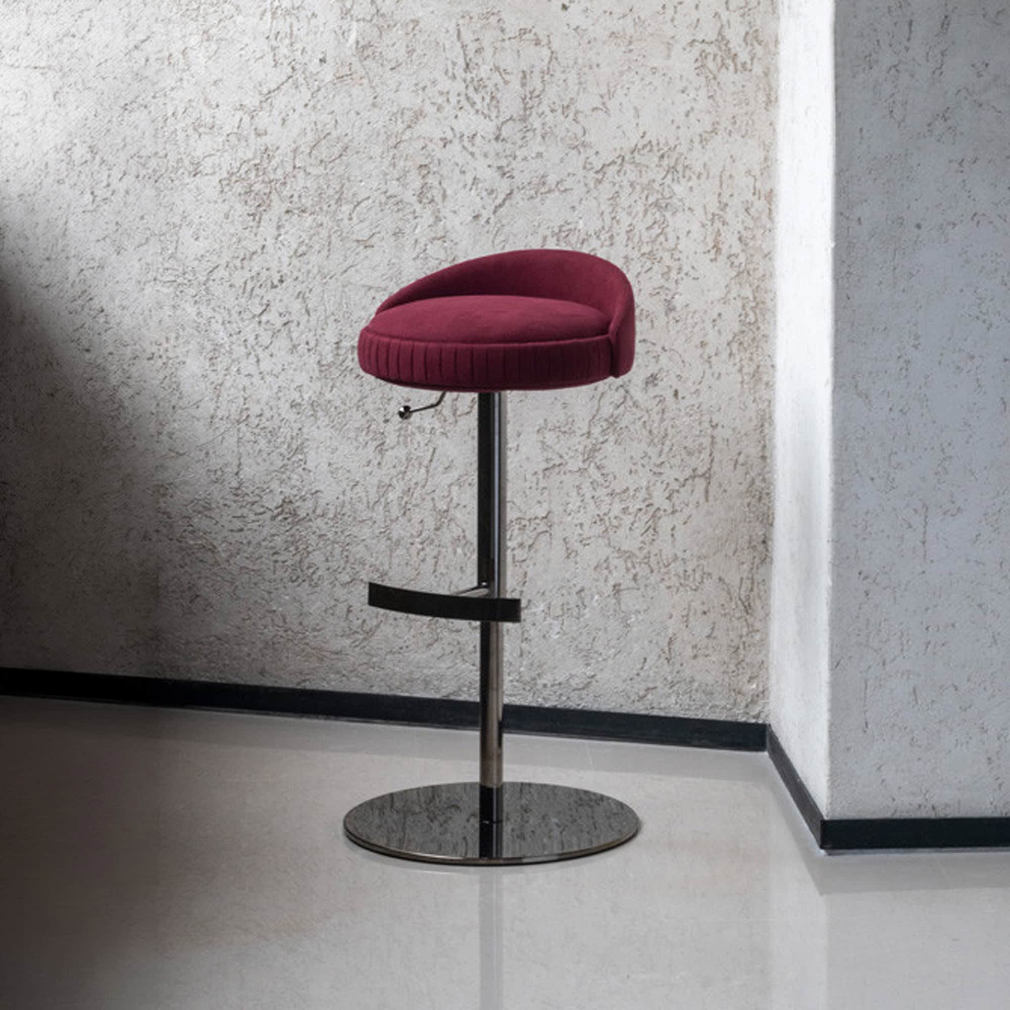 Adjustable plissé upholstered stool with modern design, perfect for stylish seating in contemporary.