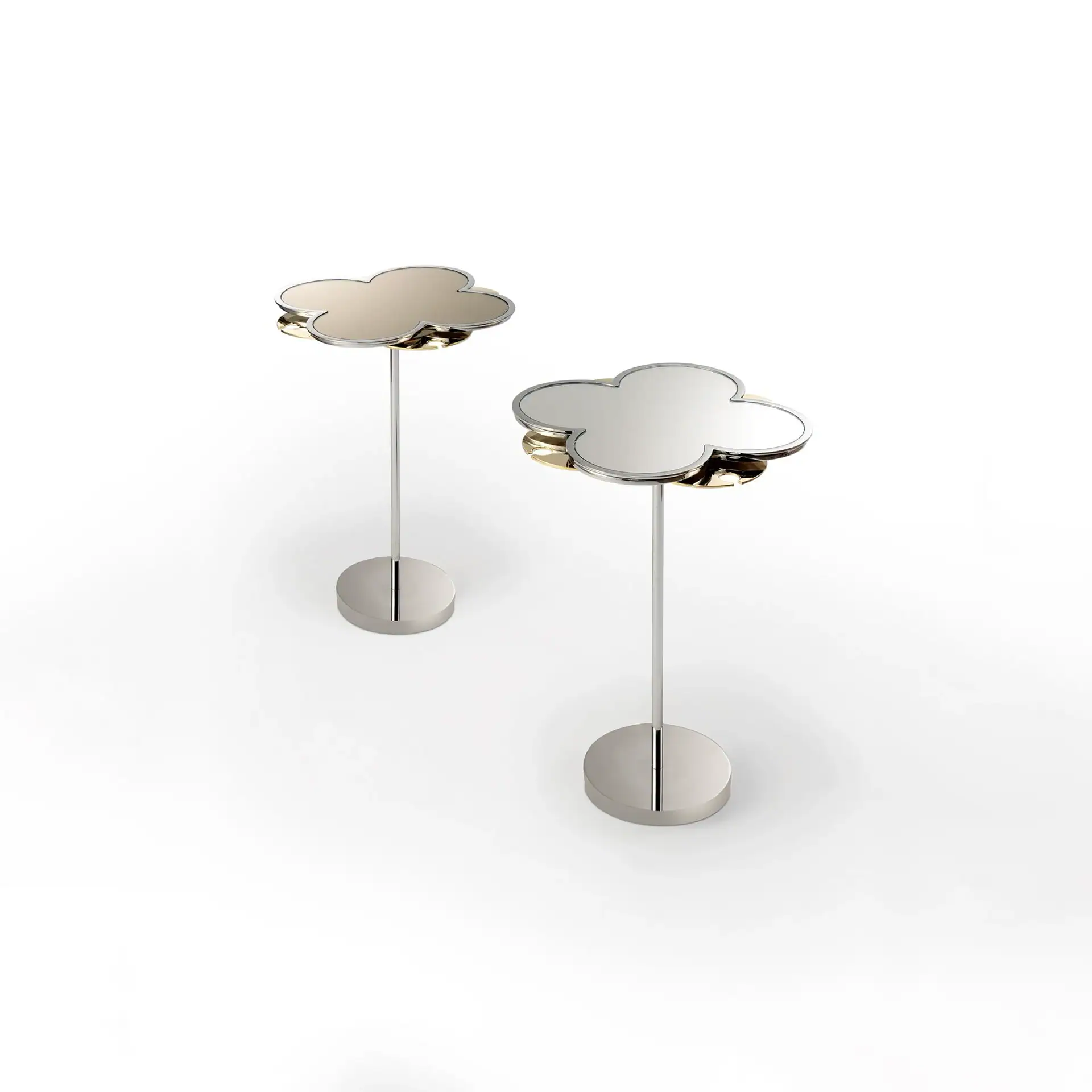 Two modern cloud-shaped side tables with polished silver tops and golden accents on slender silver stems with circular bases, set against a white background.