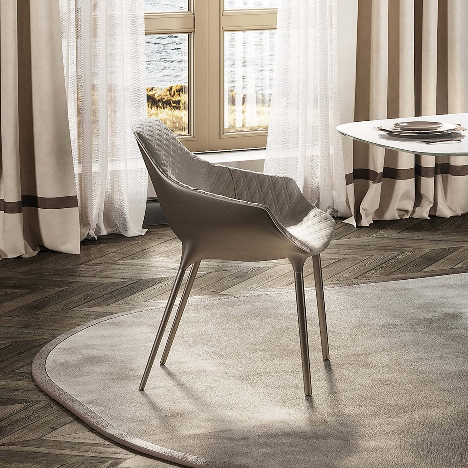 Elegant Milady upholstered dining chair with quilted fabric and sleek metal legs. Perfect for modern.