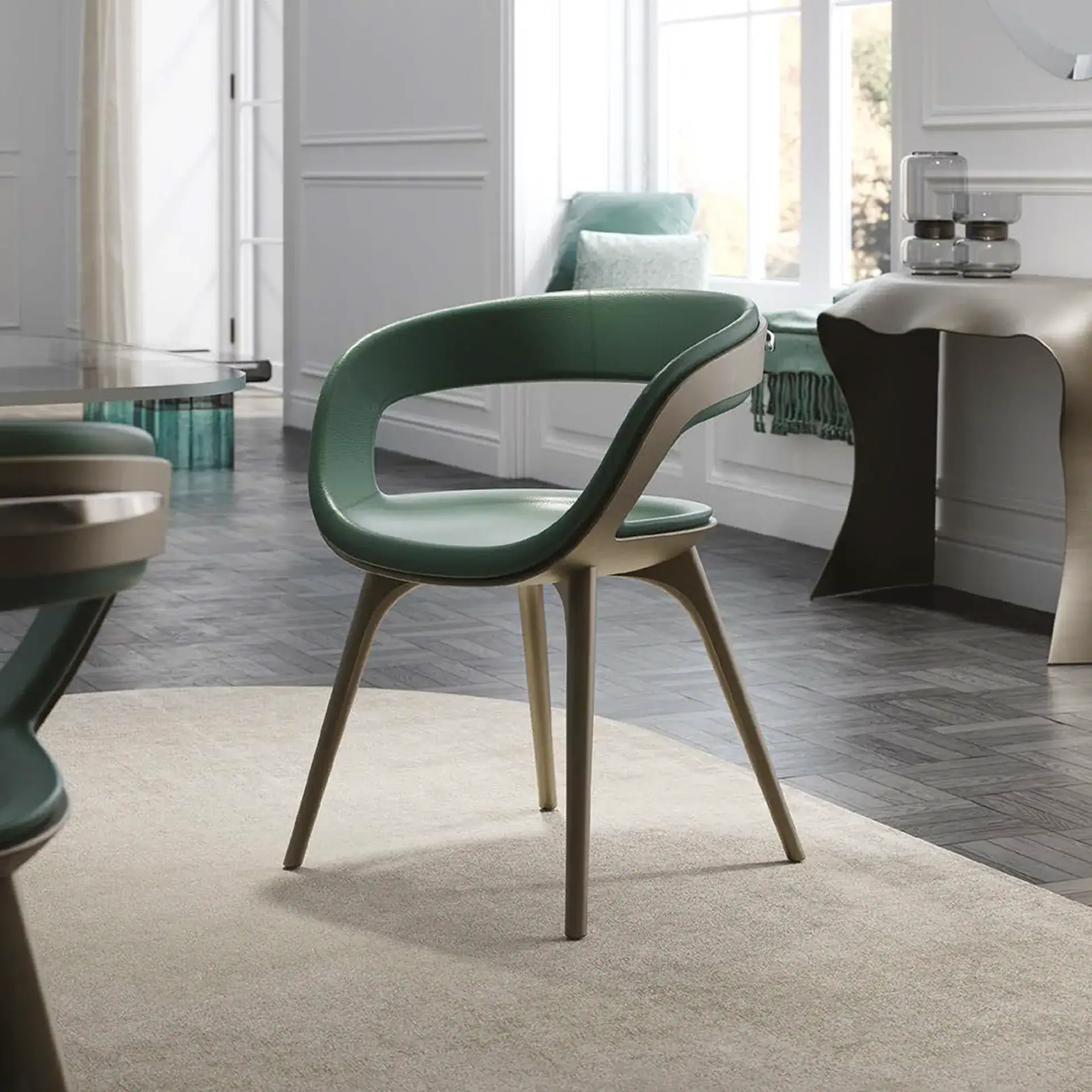 Modern Nido dining armchair with sleek design and wooden legs.