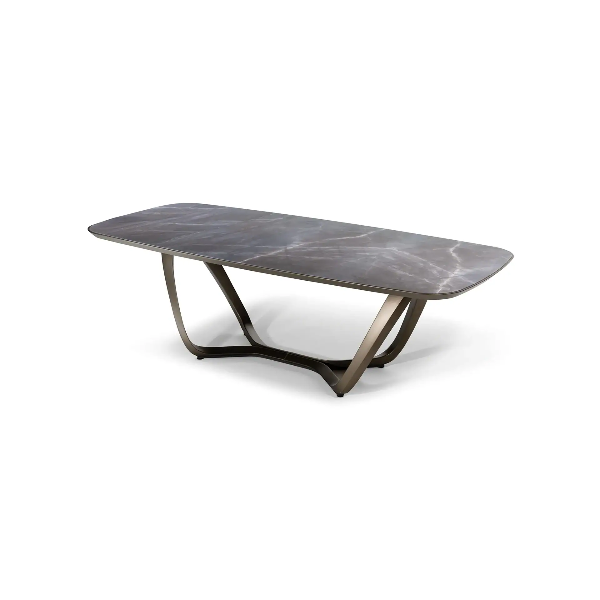 A modern rectangular dining table with a dark gray marble-patterned top and a sculptural bronze-colored metal base, set against a white background.