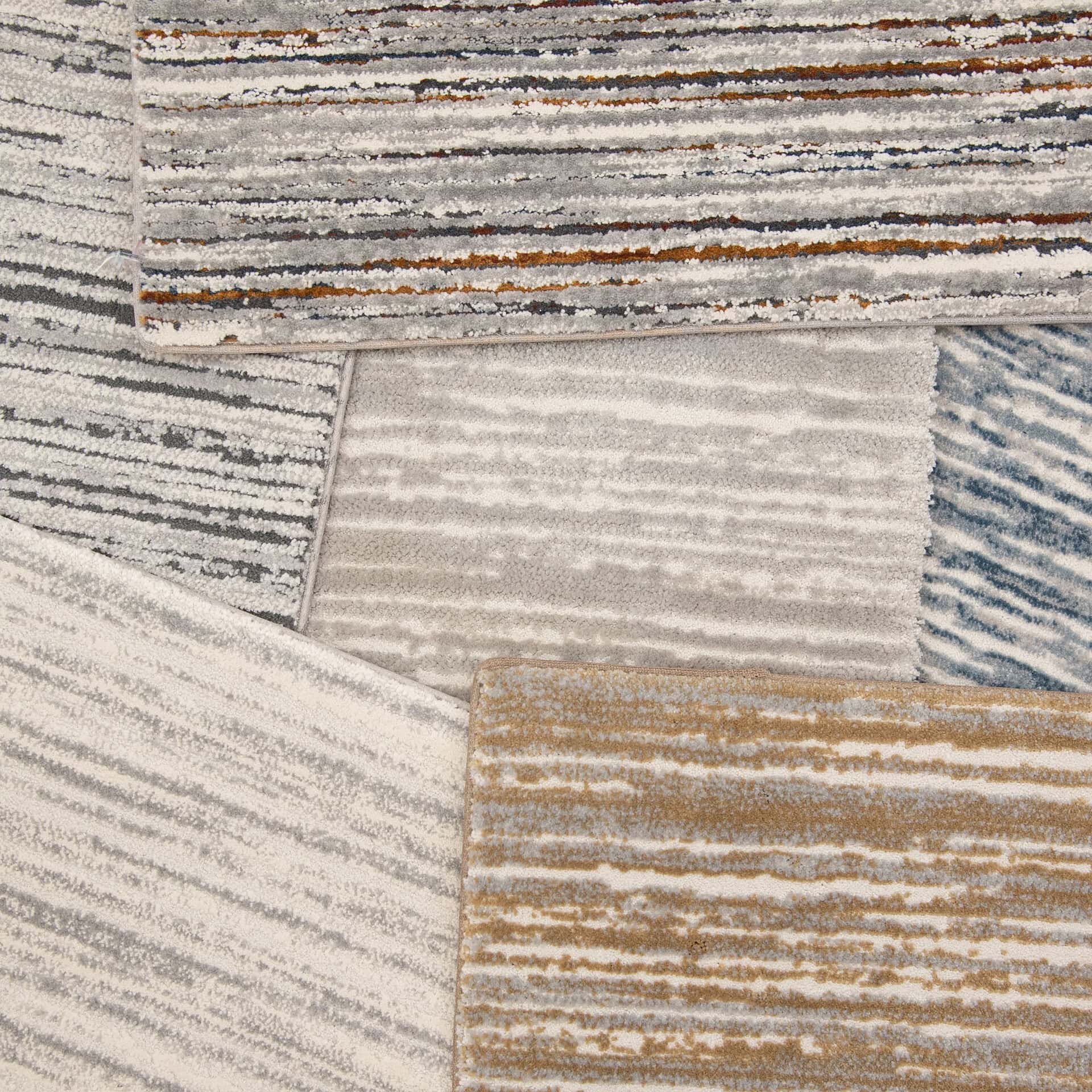 Modern Rock Star patterned area rug with neutral tones and textured design.