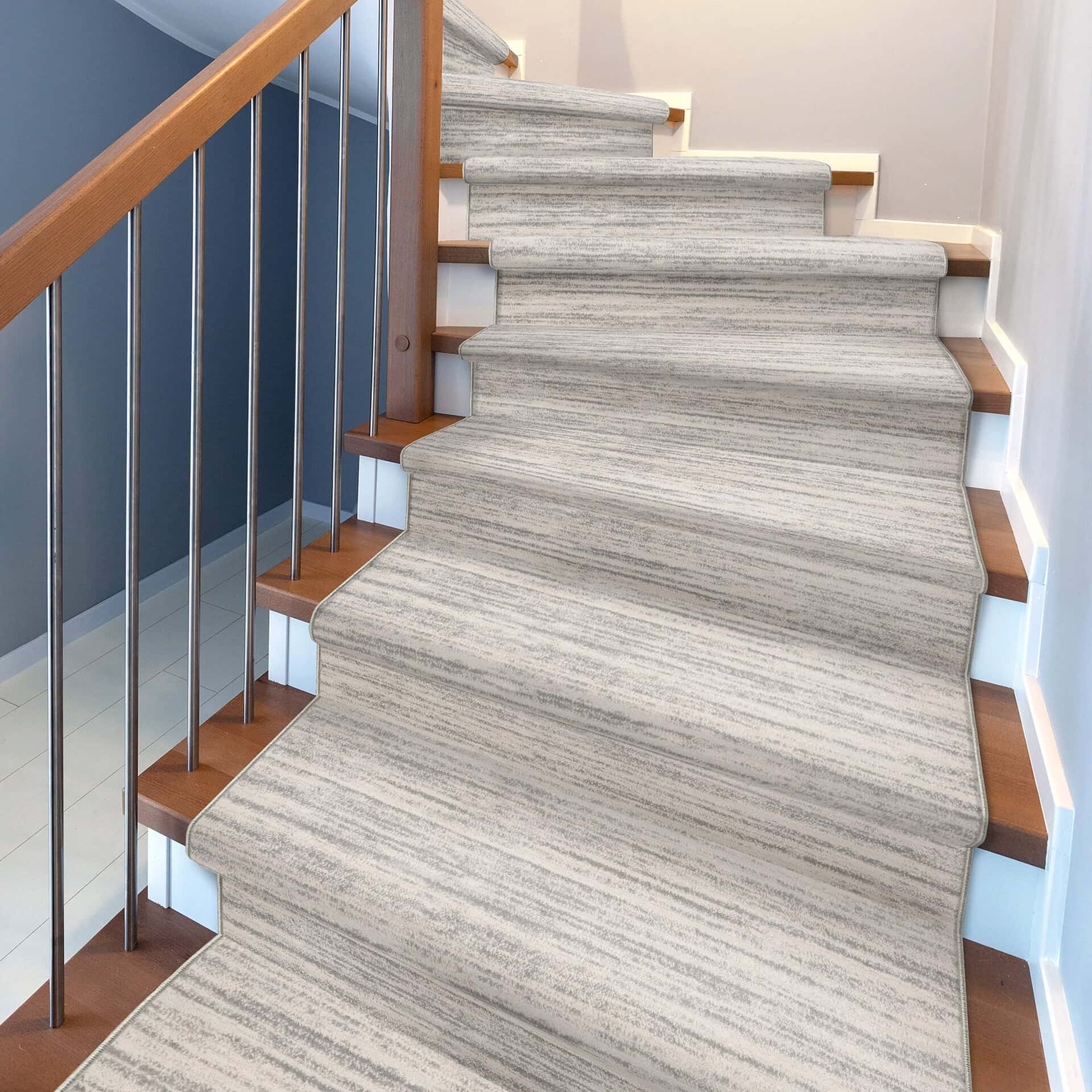 Stylish Rock Star patterned area rug on staircase for modern home decor.