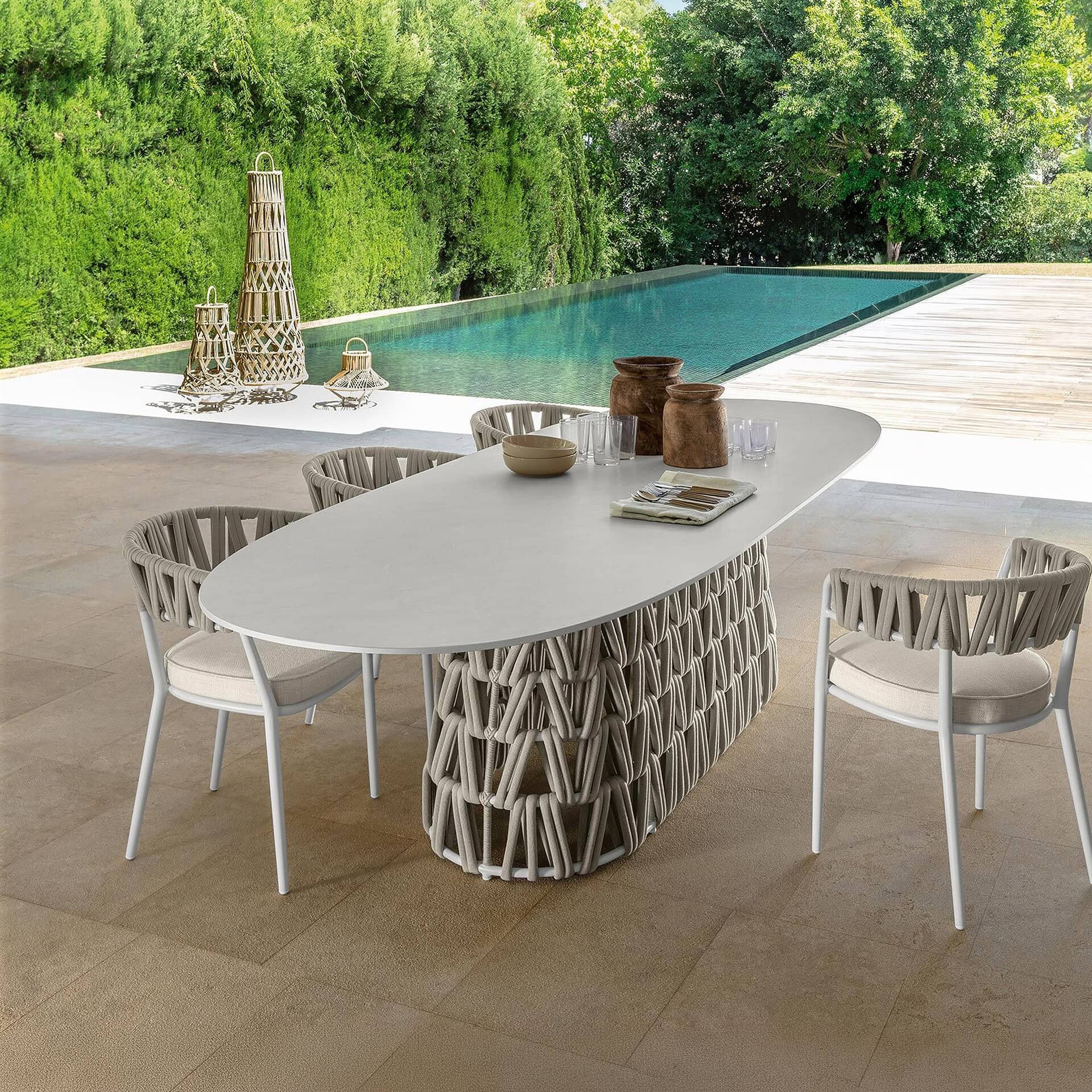 Outdoor dining table for poolside gatherings.