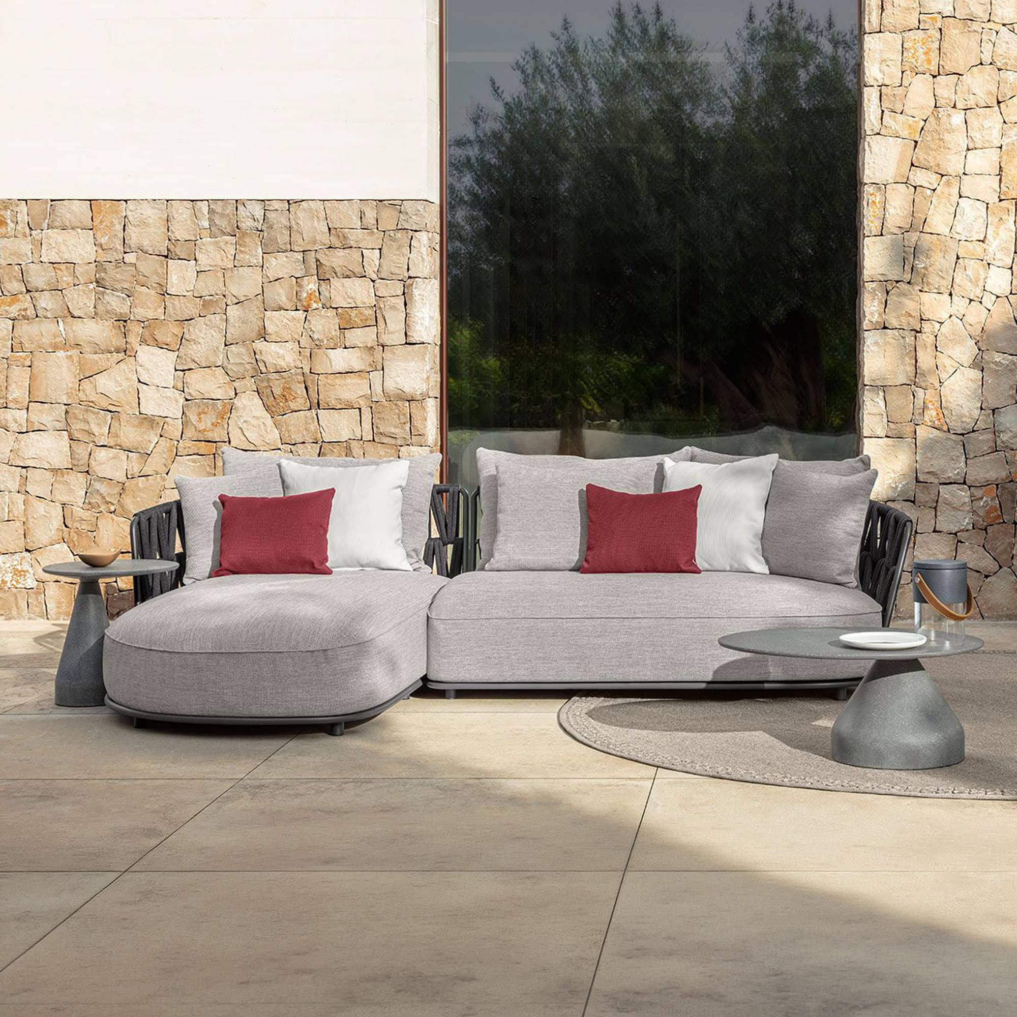 Outdoor modular sectional sofa with plush cushions and contemporary design, perfect for outdoor livi.