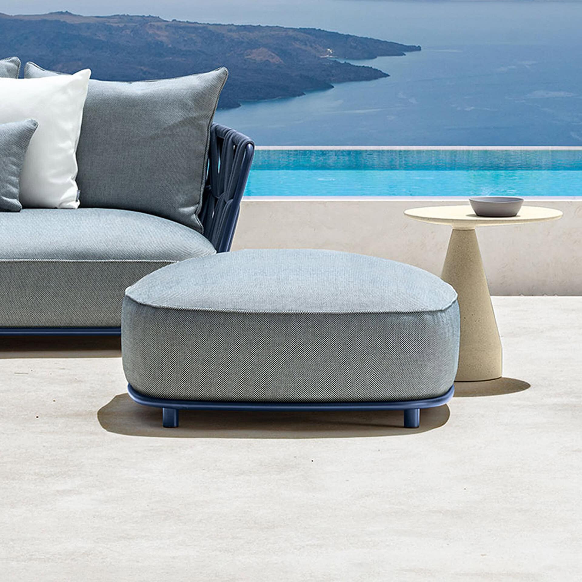 Outdoor swim-inspired pouf for patio seating.