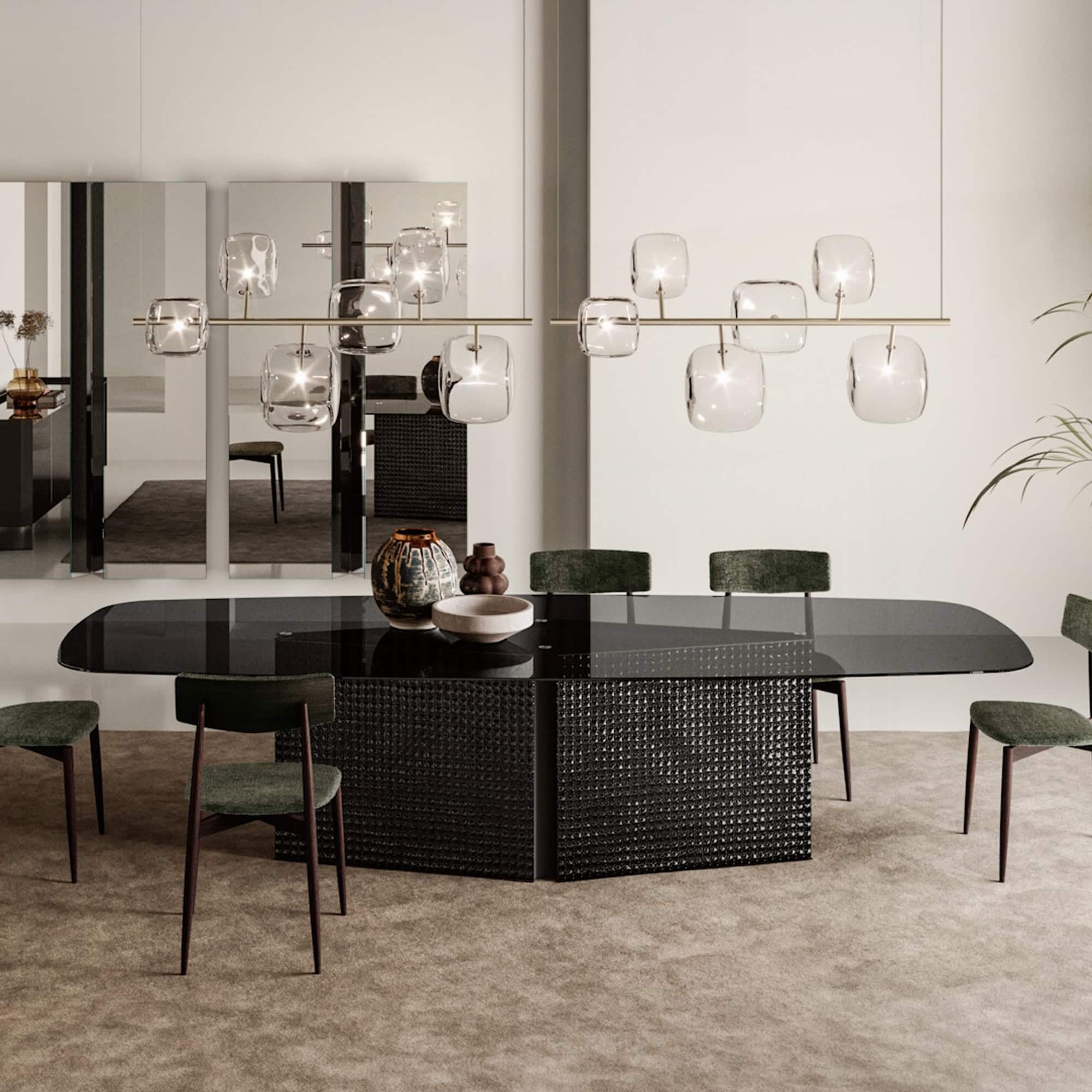 Elegant Bow sculptural glass dining table with a sleek black base, perfect for contemporary dining s.