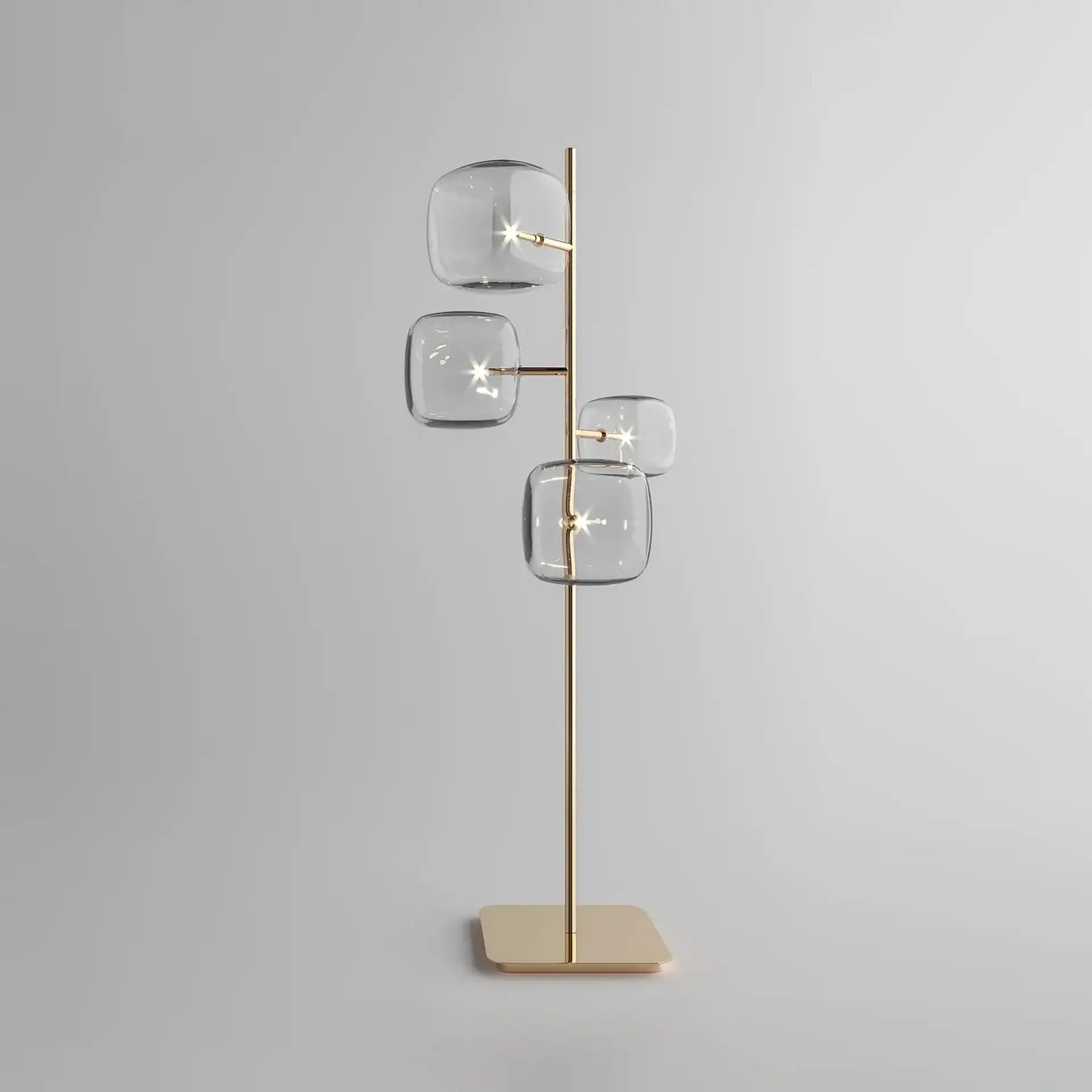 Modern glass and brass floor lamp with multiple globes for stylish lighting.