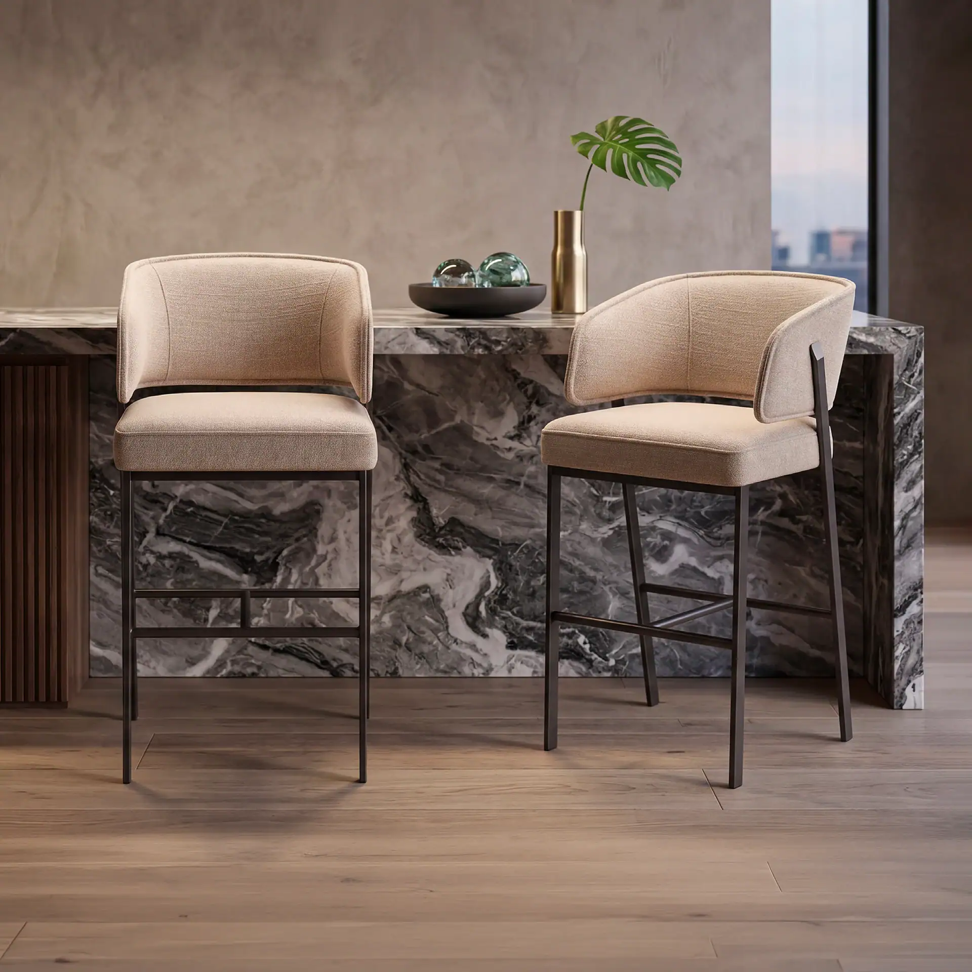Elegant beige bar stools with black metal legs in modern interior.