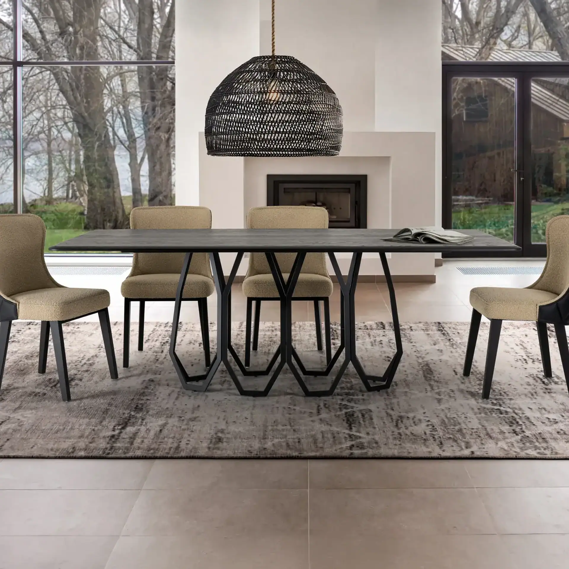 Modern dining room with large windows, contemporary table, and chairs.