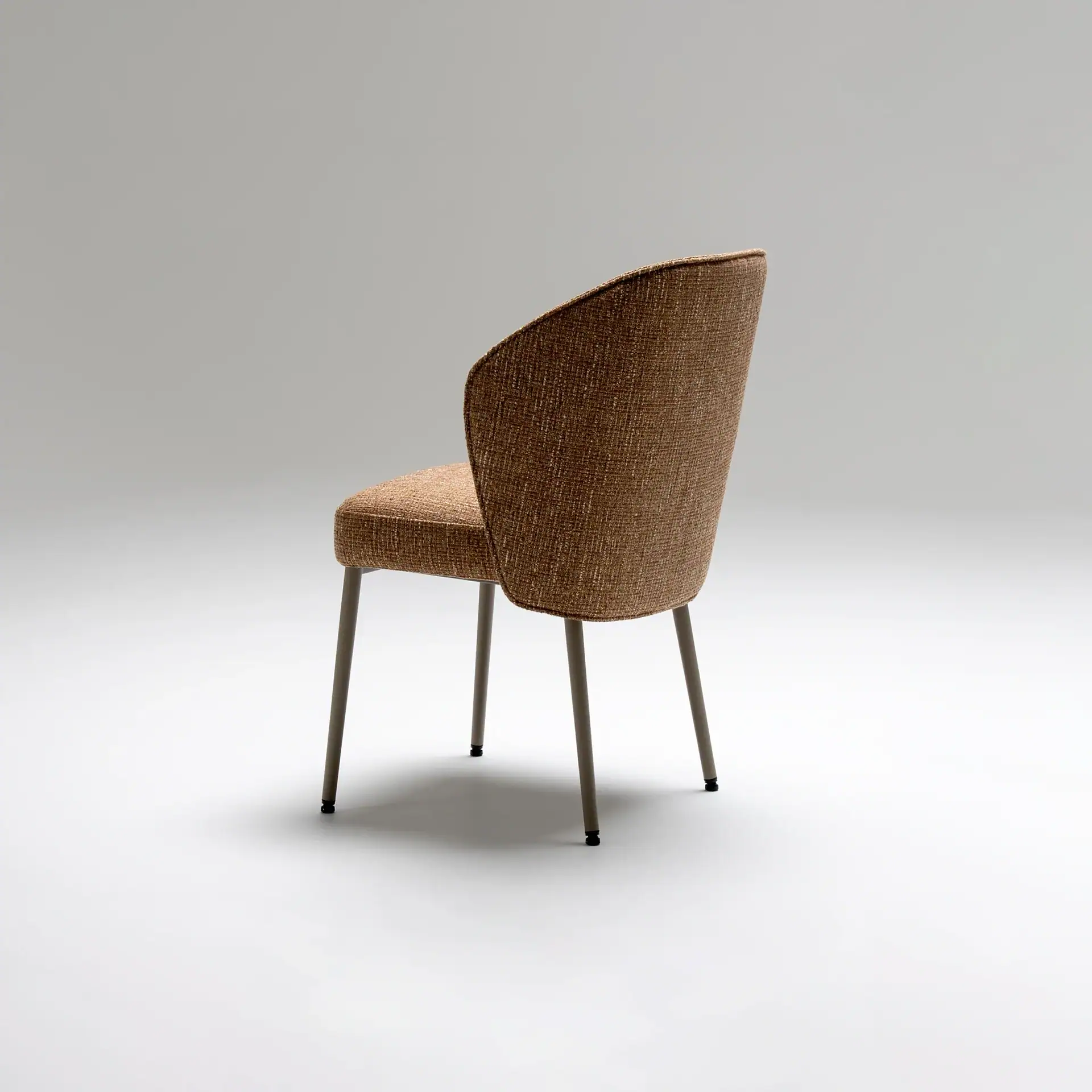 Sklar Furnishings Tessa upholstered dining armchair in brown fabric.