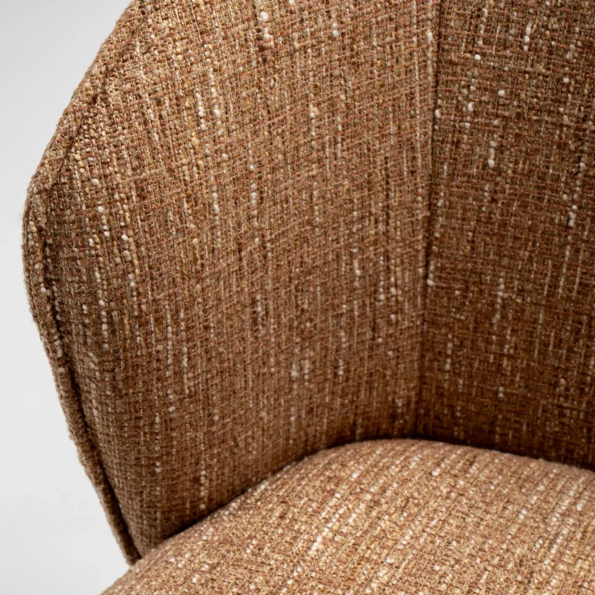 Close-up of Tessa upholstered dining armchair fabric and texture.