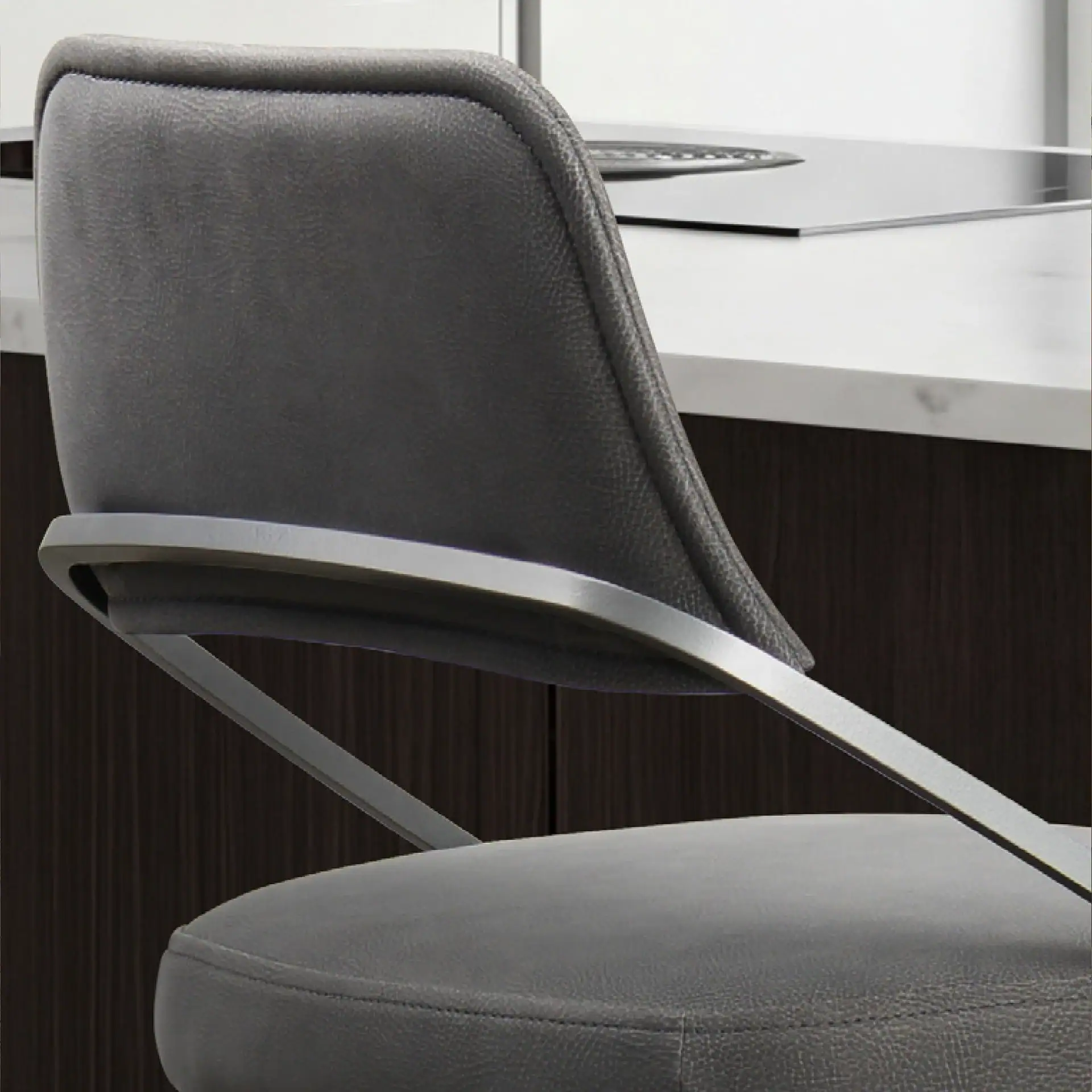 Wish Swivel Bar & Counter Stool with grey upholstery and metal frame.