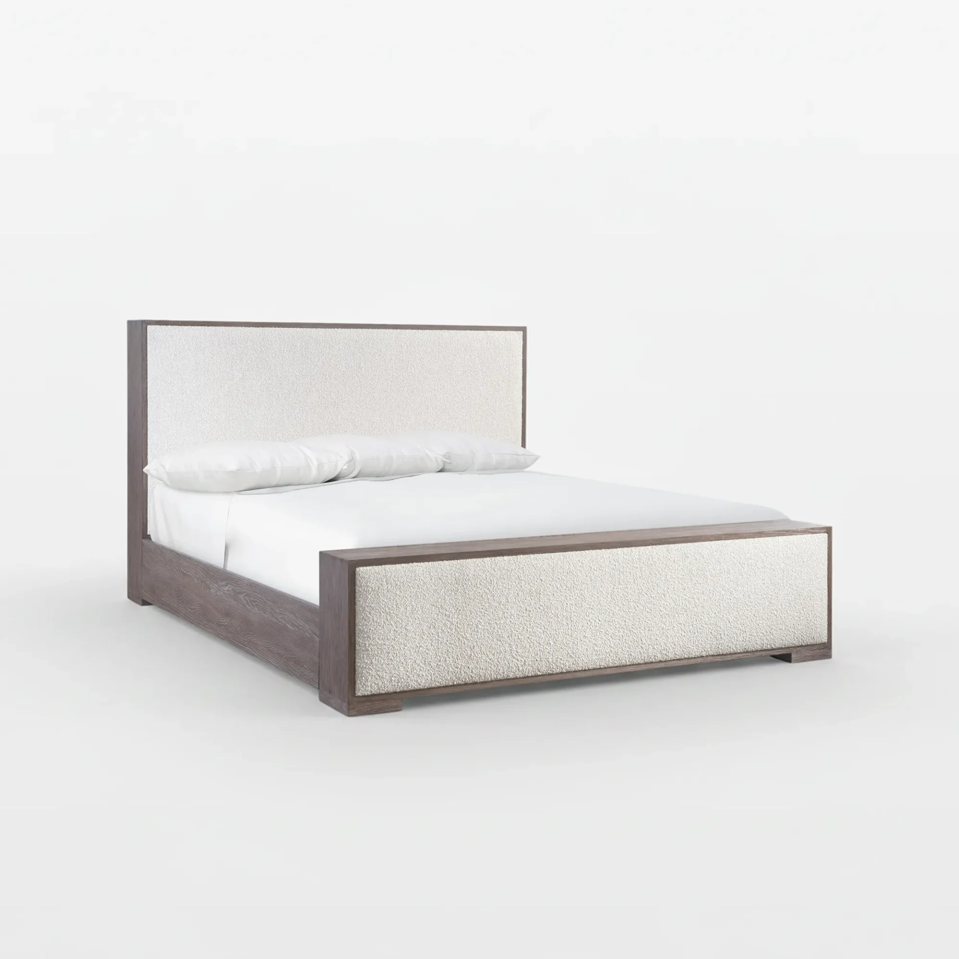 A modern platform bed with a dark wood frame and textured light beige upholstered headboard and footboard, dressed with white sheets and pillows.