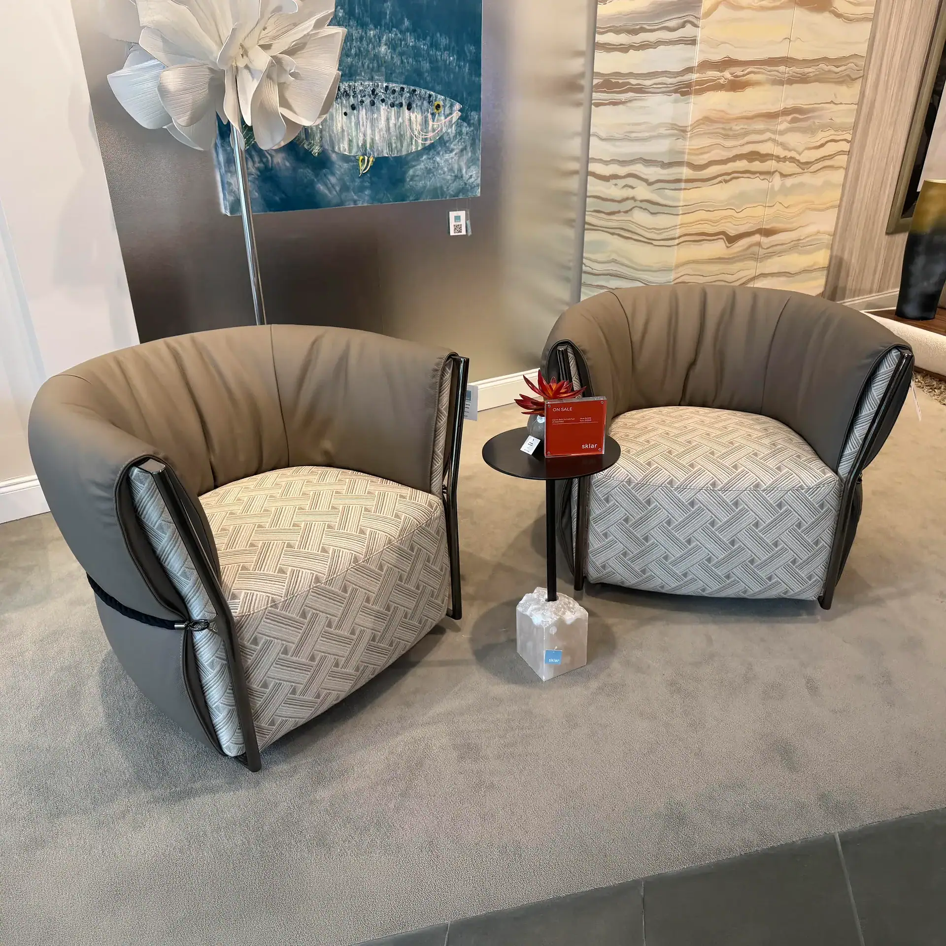 Elegant Cierre Belt Swivel Armchairs for modern living spaces.