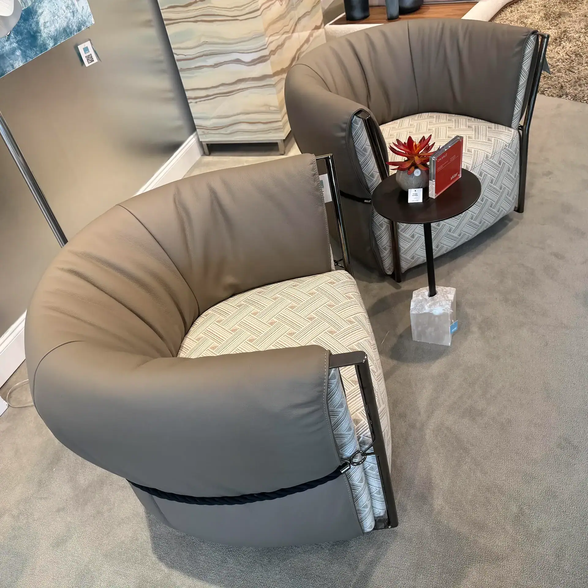 Swivel armchairs with modern design, beige and patterned fabric, perfect for stylish living spaces.