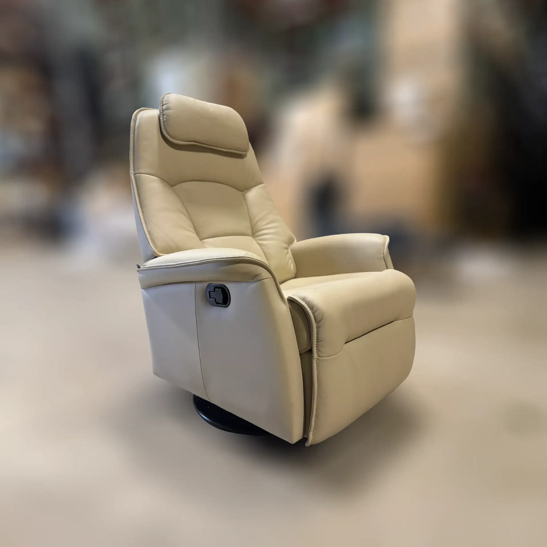 Comfortable beige power recliner chair with adjustable headrest and armrest.