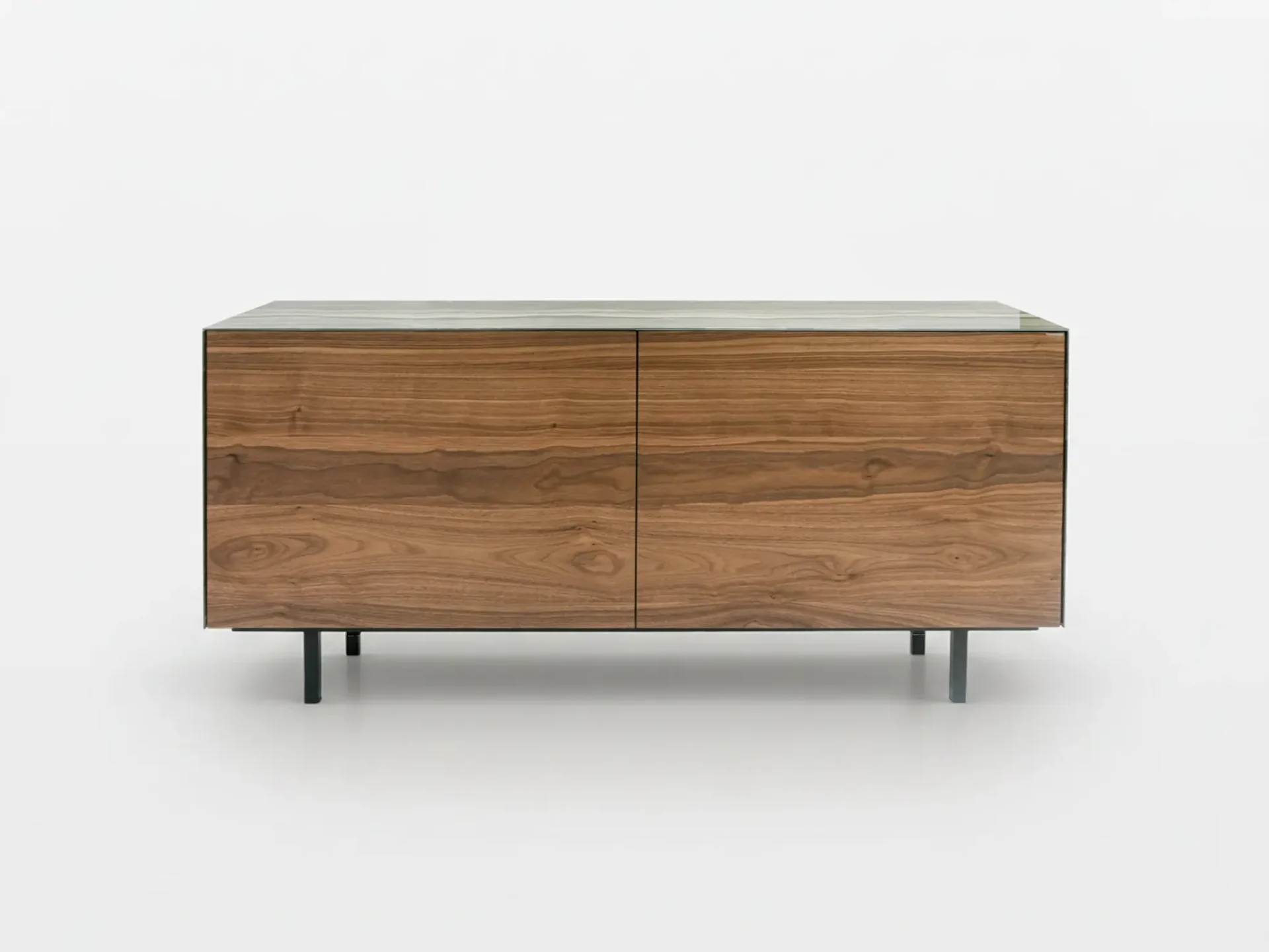 A modern wooden cabinet with two doors, a light-colored top, and dark metal legs, against a white background.