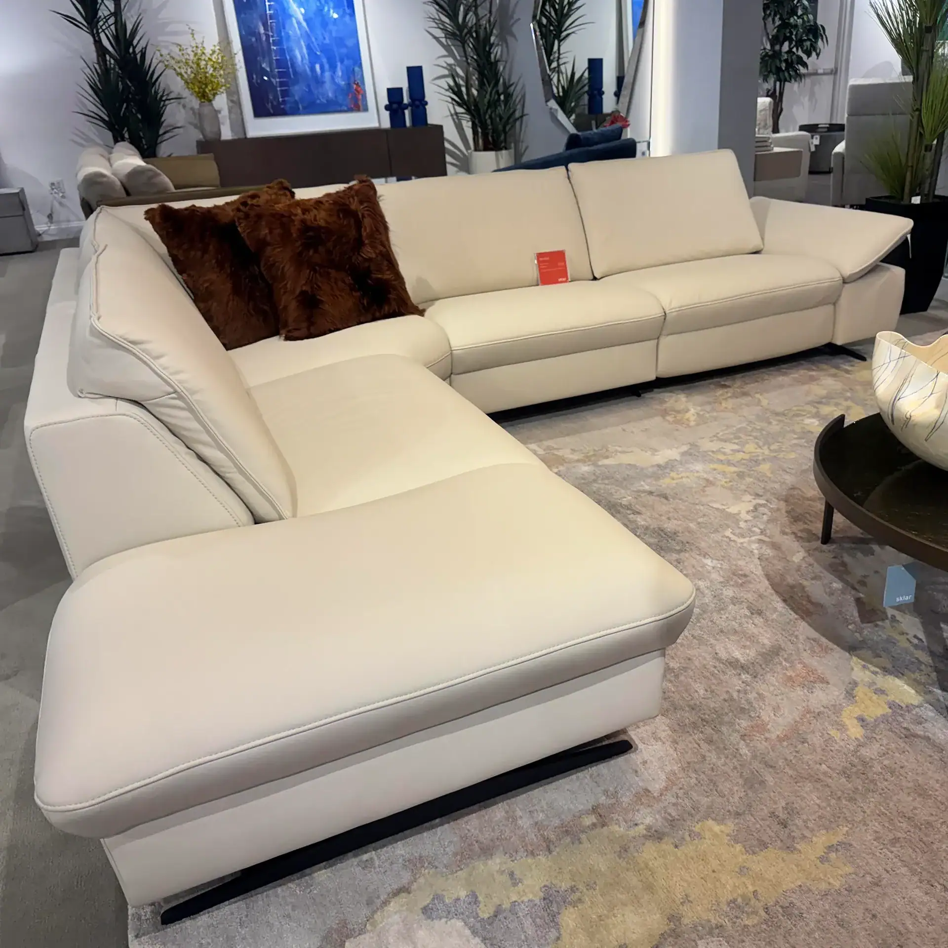 Alvaro sectional sofa by Himolla, featuring plush cushions and modern design. Perfect for stylish, c.