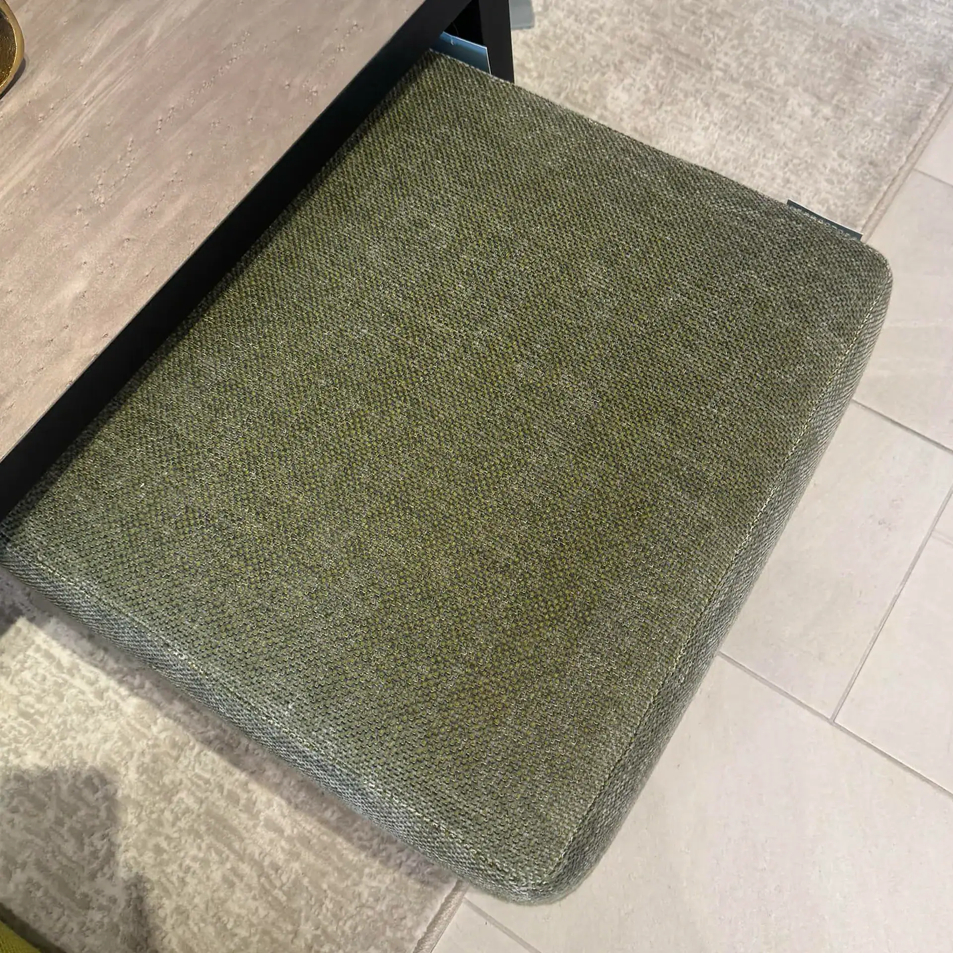 Green fabric pouf from Il Loft Dilmos collection by Sklar Furnishings, stylish and versatile seating.