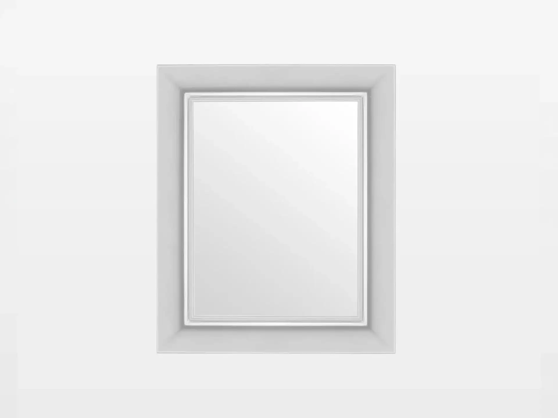 Ghost Mirror Small by Kartell, elegant and minimalist decorative mirror.